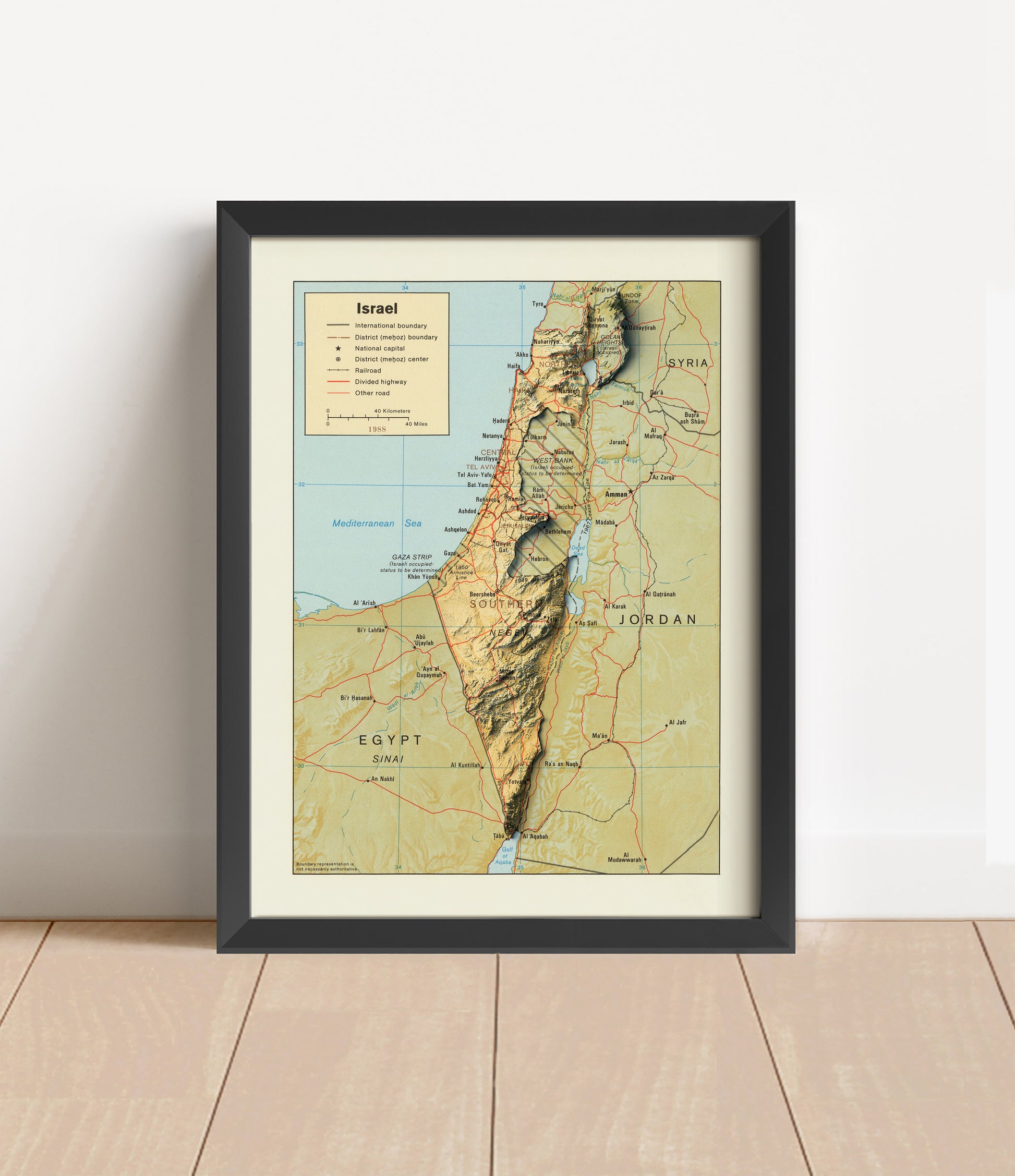 Vintage Israel shaded relief map in black frame. Artistic print with realistic terrain effect for wall decor