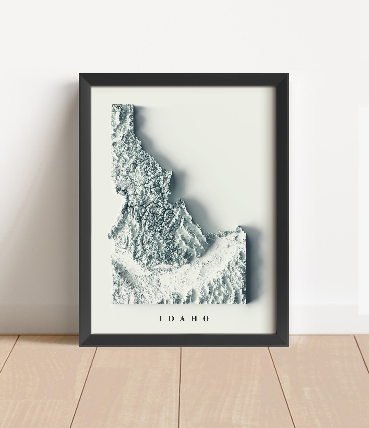 Idaho shaded relief map in black frame. Artistic print with realistic terrain effect for wall decor