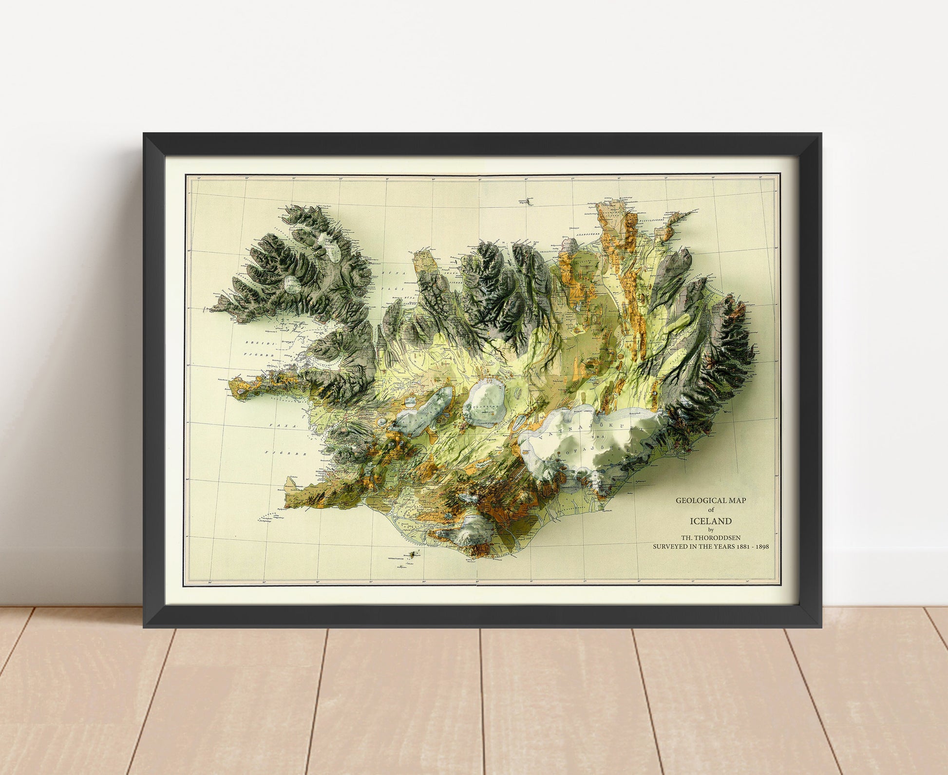 Vintage Iceland shaded relief map in black frame. Artistic print with realistic terrain effect for wall decor