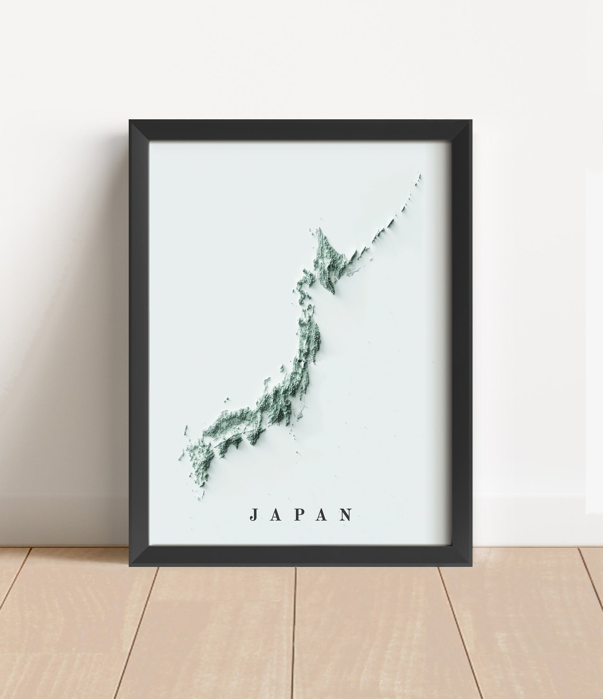 Japan shaded relief map in black frame. Artistic print with realistic terrain effect for wall decor
