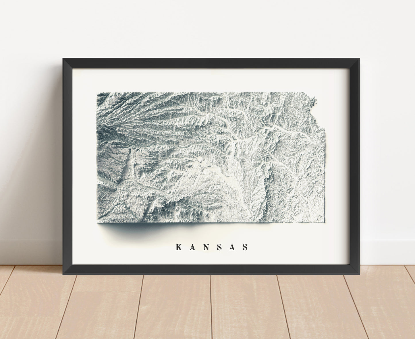 Kansas shaded relief map in black frame. Artistic print with realistic terrain effect for wall decor