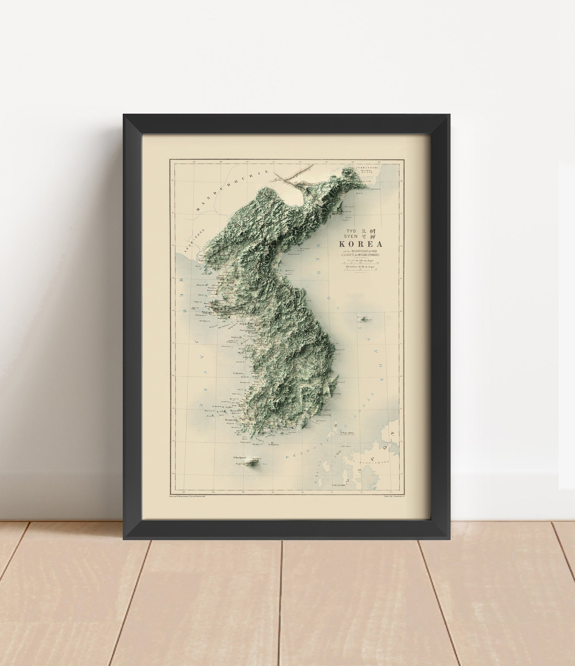 Vintage Koreas shaded relief map in black frame. Artistic print with realistic terrain effect for wall decor