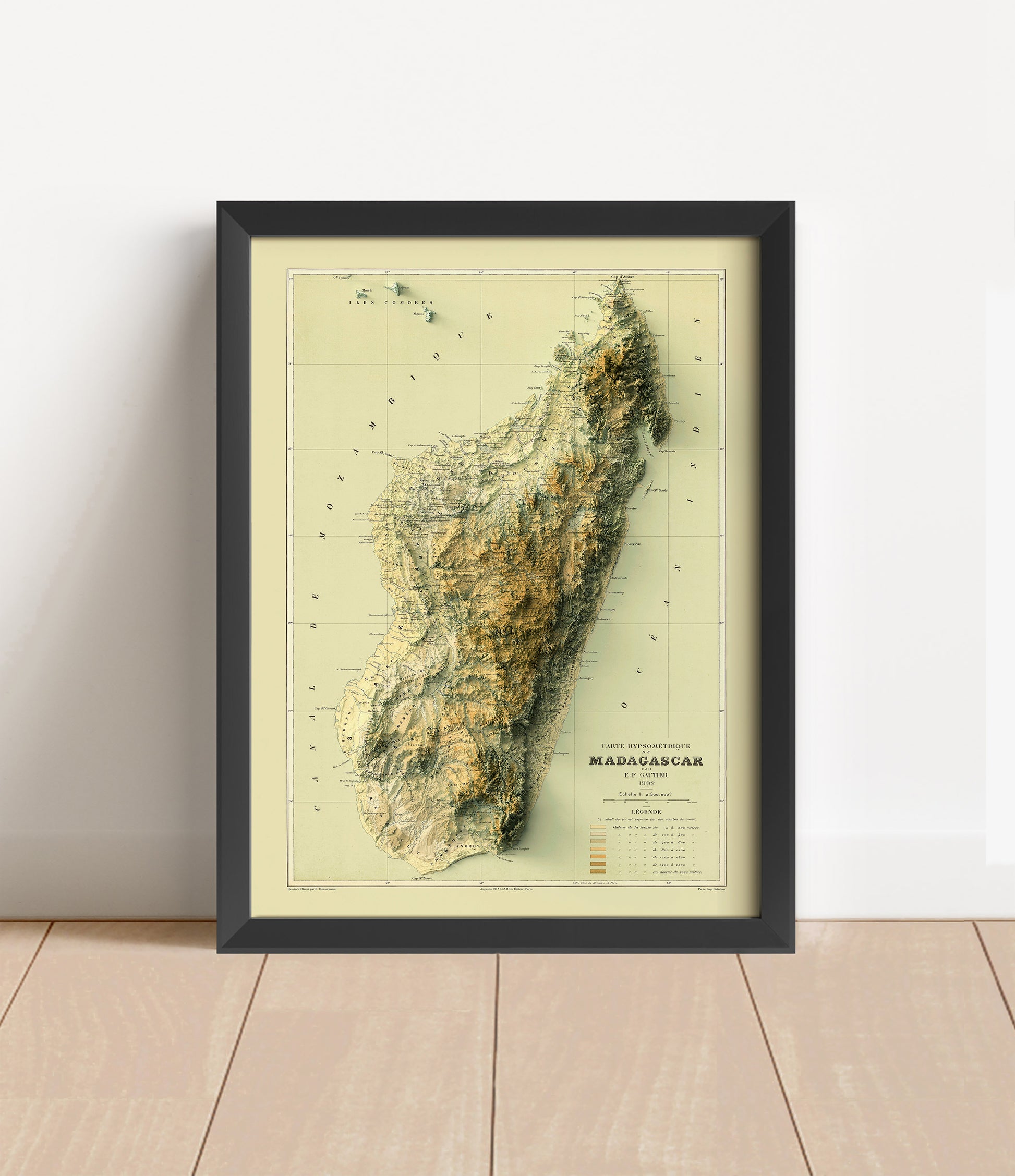 Vintage Madagascar shaded relief map in black frame. Artistic print with realistic terrain effect for wall decor