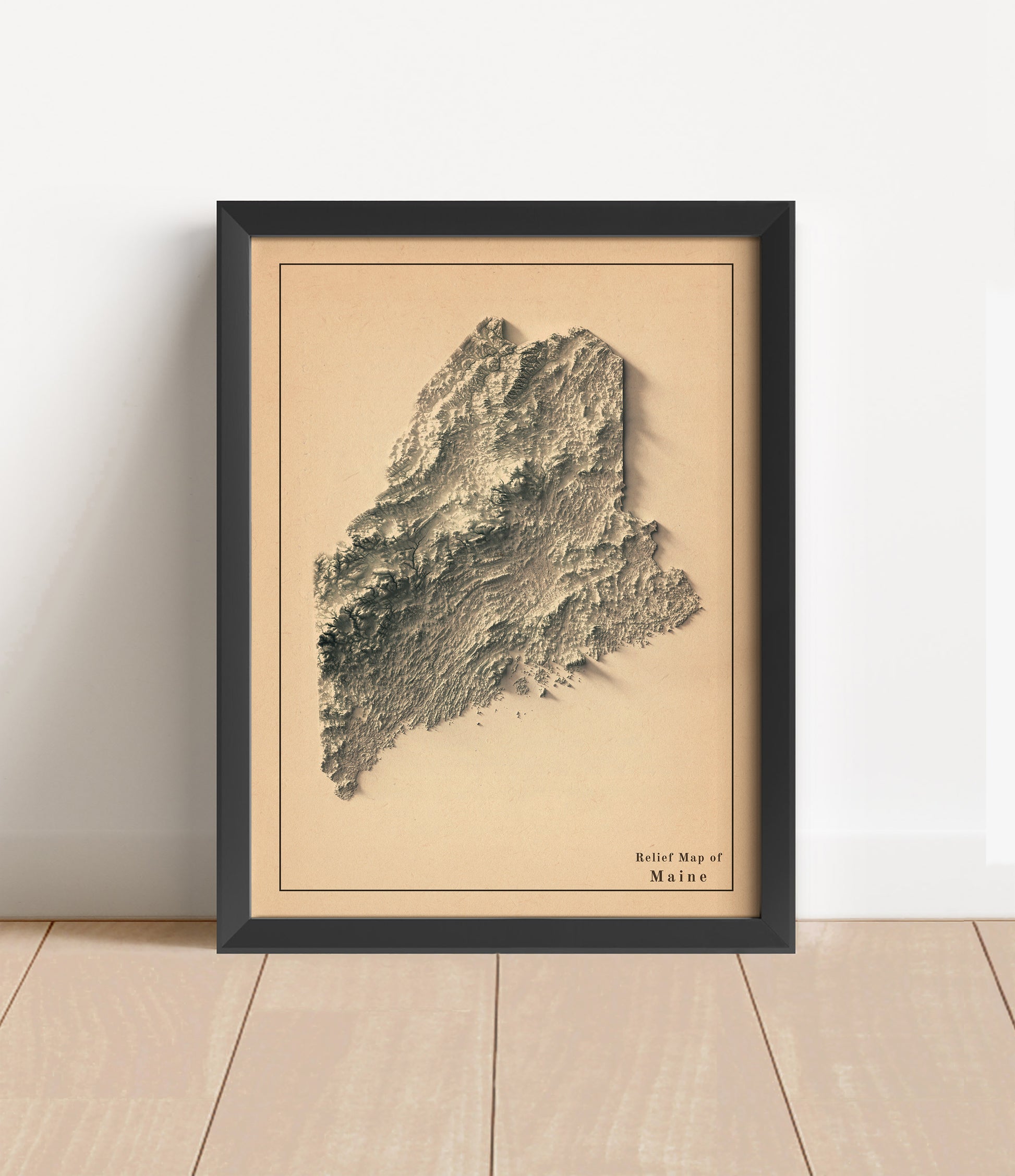 Vintage Maine shaded relief map in black frame. Artistic print with realistic terrain effect for wall decor