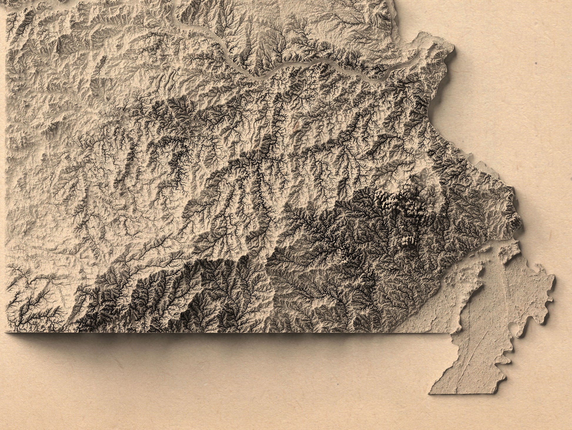 Detailed close-up of a vintage Missouri USA relief map, showcasing textured topography and geographic contours