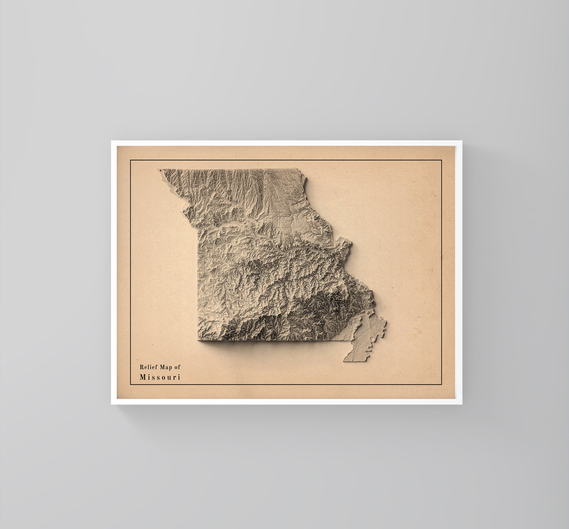 Missouri USA vintage framed shaded relief map in white frame. Artistic print highlighting mountains with a realistic 3d effect