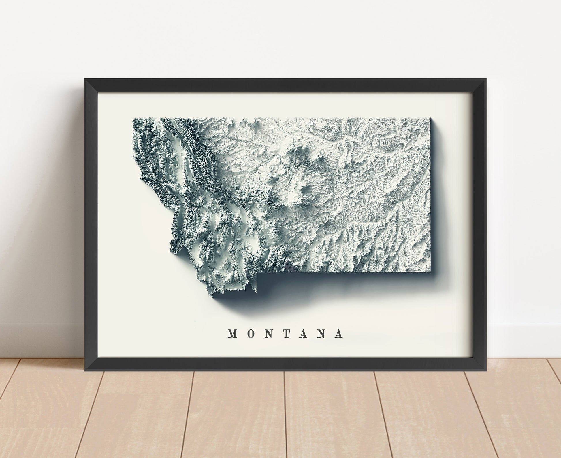 Montana shaded relief map in black frame. Artistic print with realistic terrain effect for wall decor