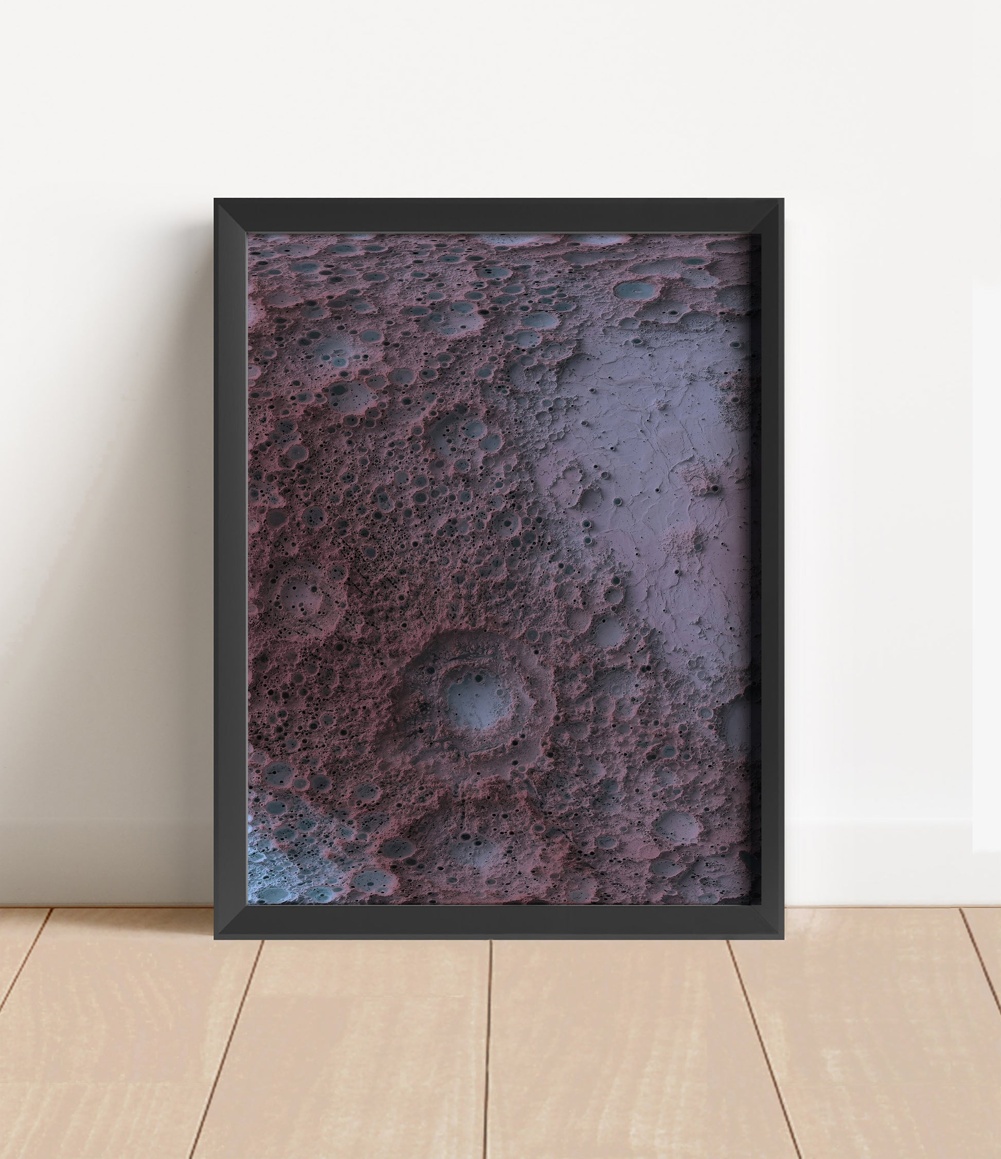 Moon shaded relief map in black frame. Artistic print with realistic terrain effect for wall decor