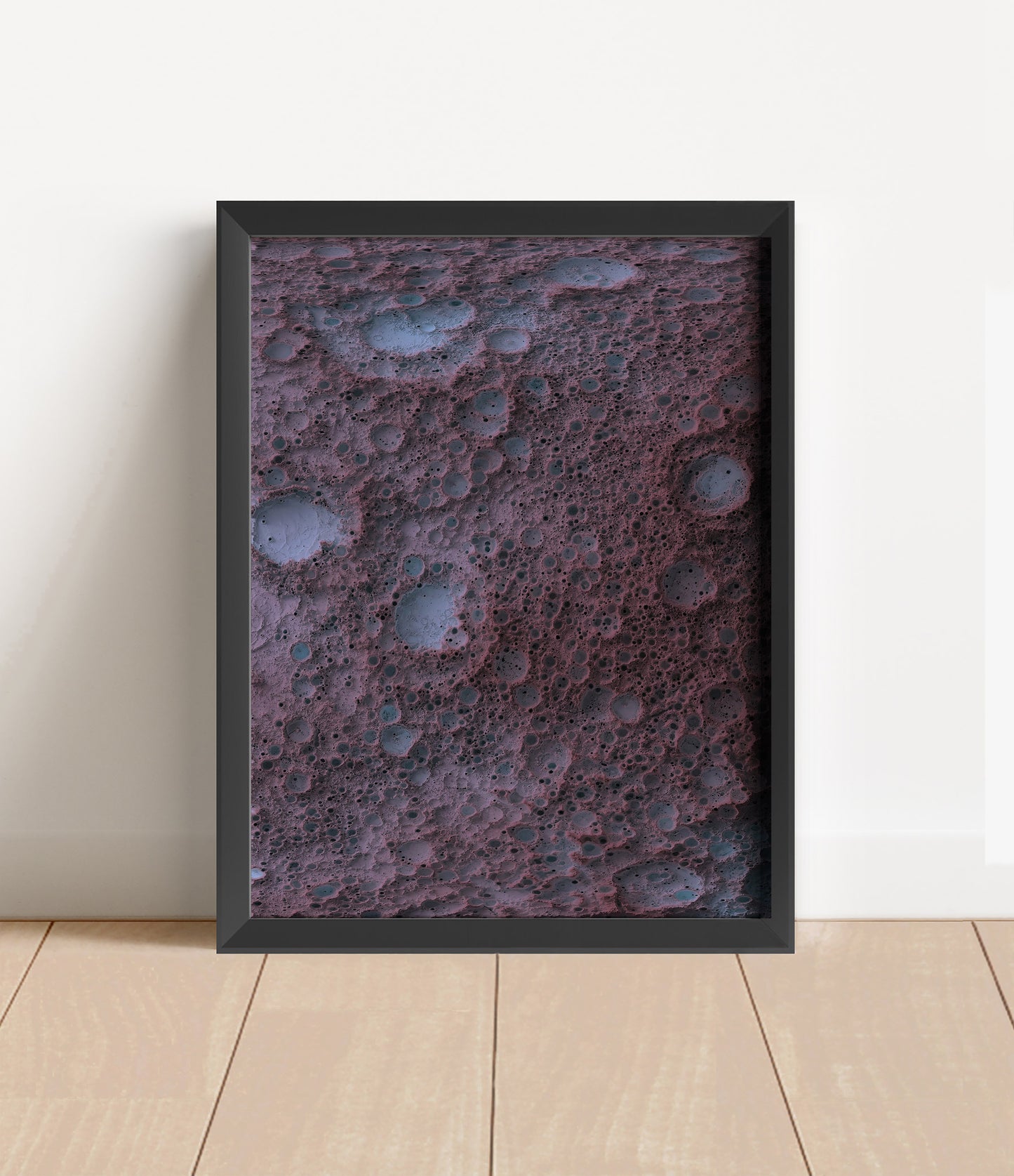 Moon shaded relief map in black frame. Artistic print with realistic terrain effect for wall decor