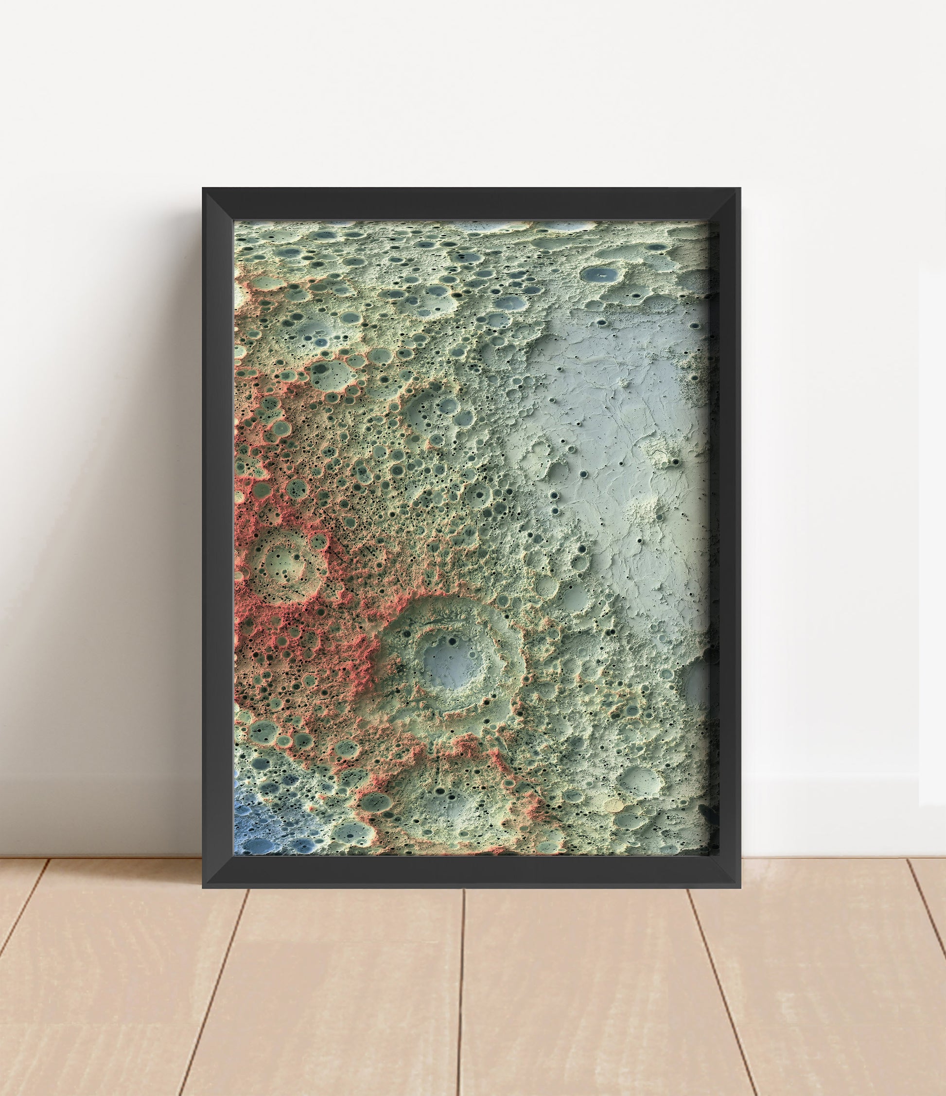 Moon shaded relief map in black frame. Artistic print with realistic terrain effect for wall decor
