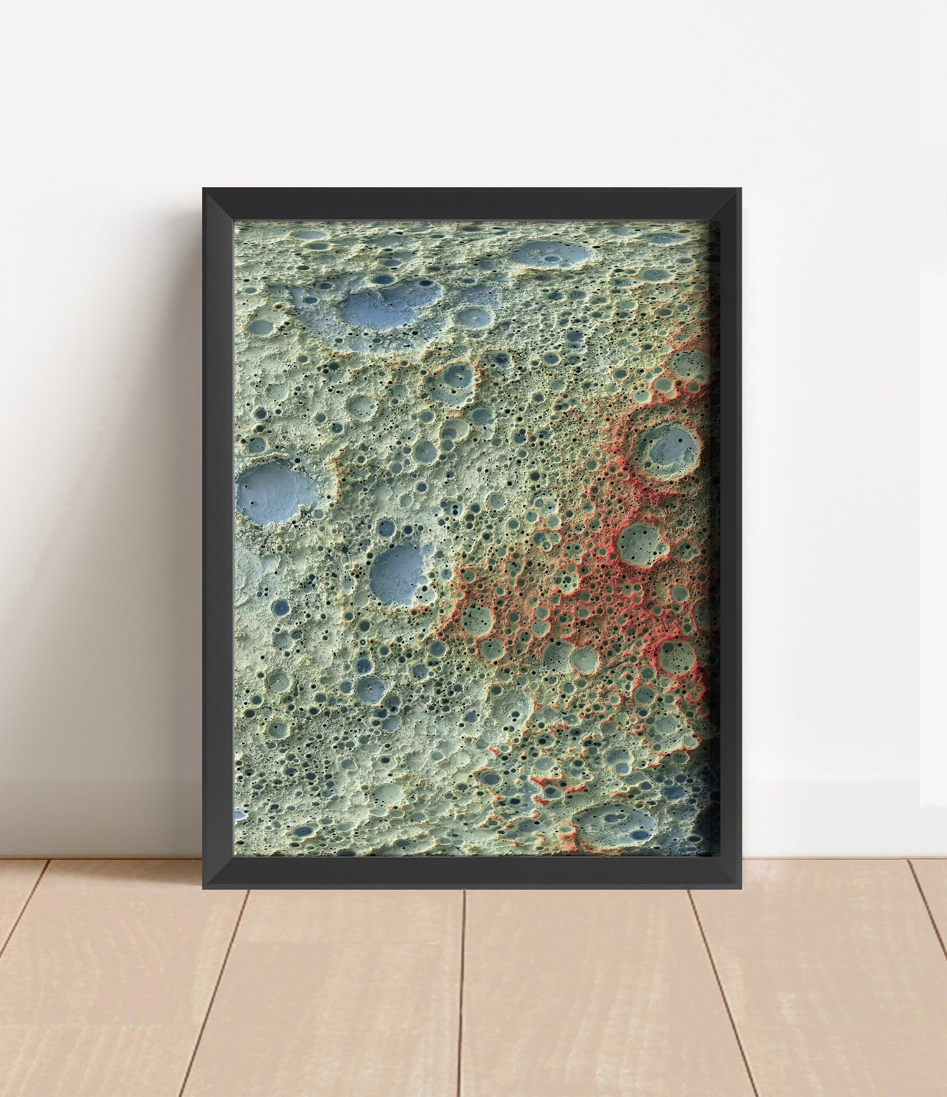 Moon shaded relief map in black frame. Artistic print with realistic terrain effect for wall decor