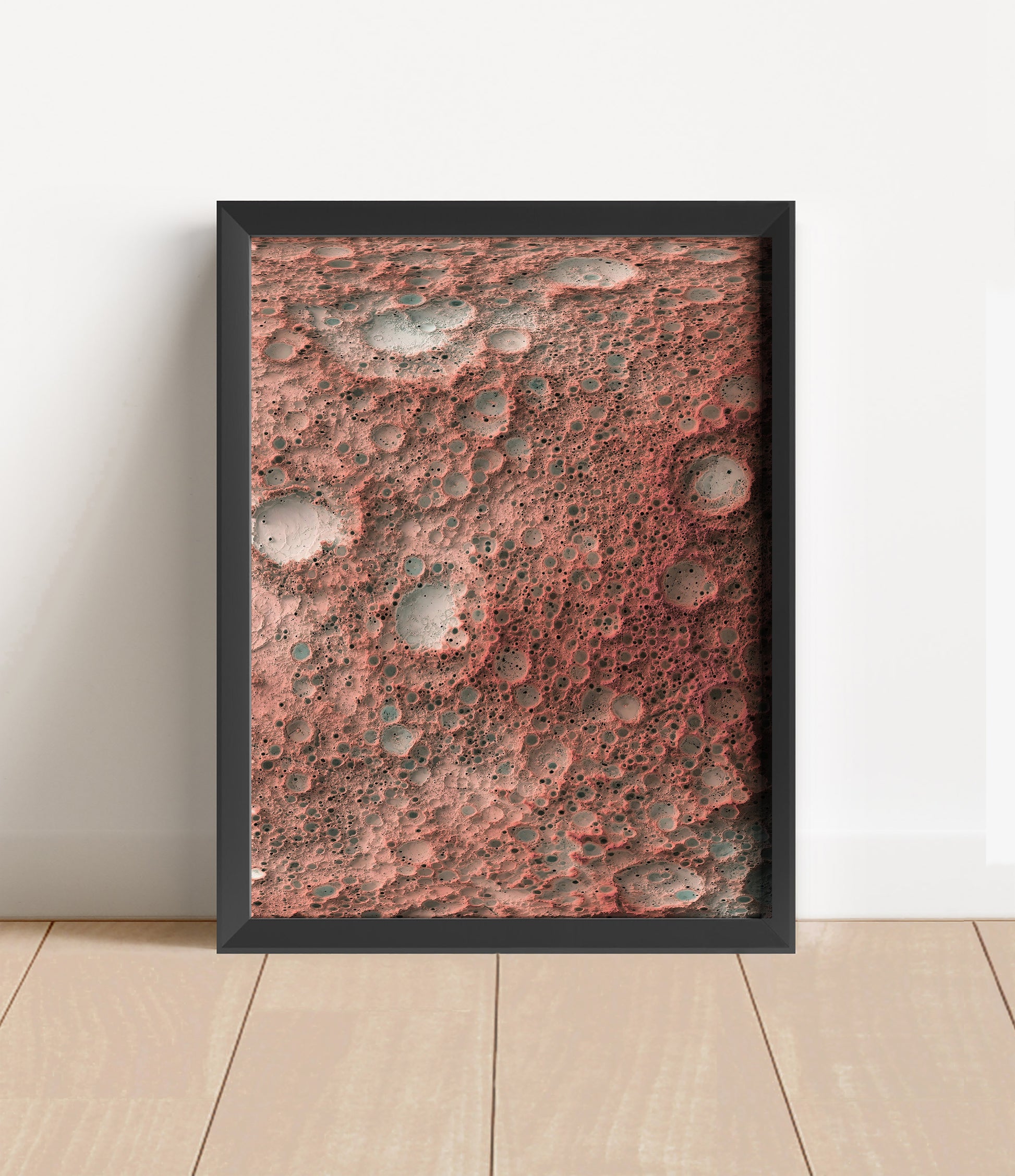 Moon shaded relief map in black frame. Artistic print with realistic terrain effect for wall decor