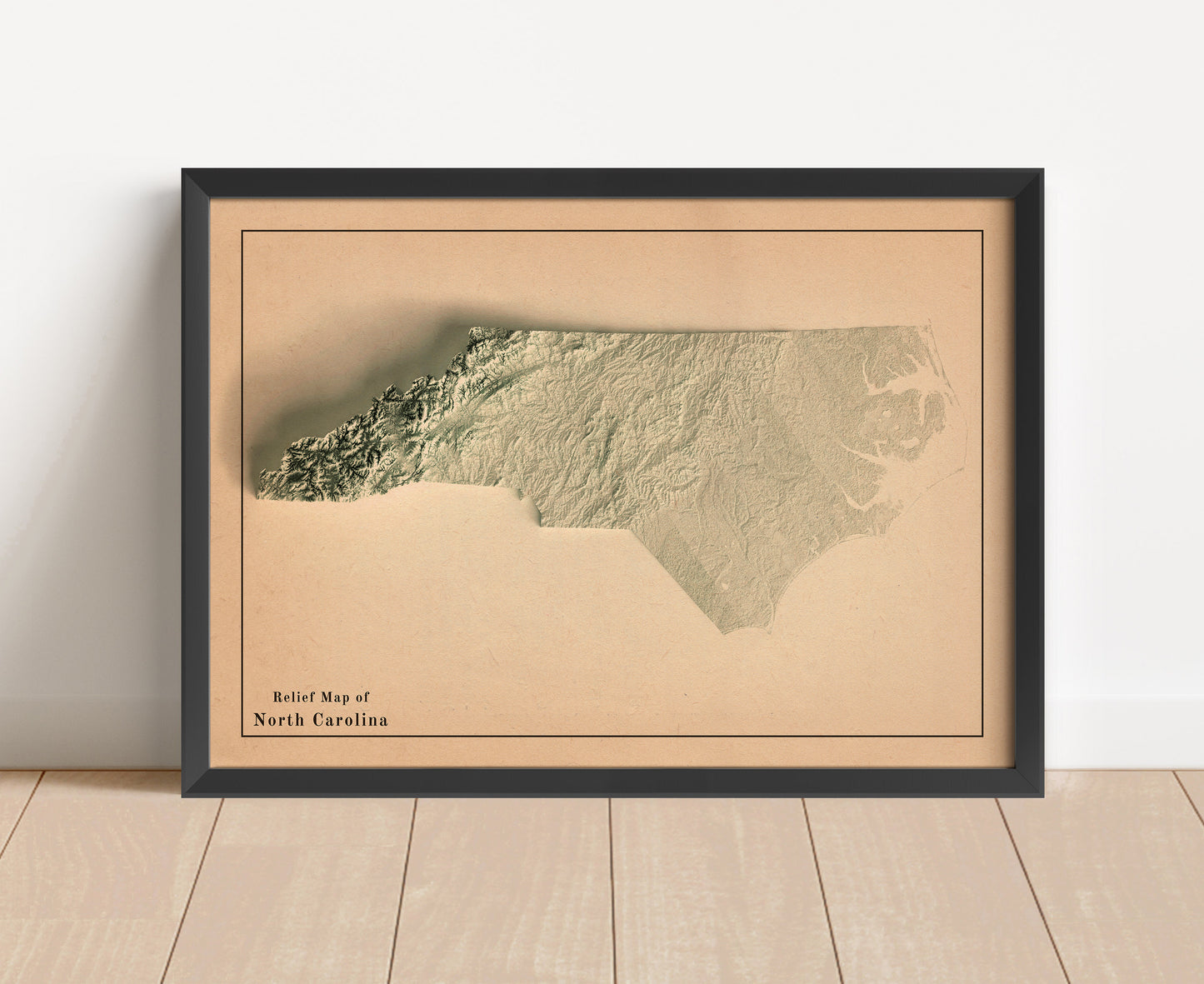 Vintage North Carolina shaded relief map in black frame. Artistic print with realistic terrain effect for wall decor