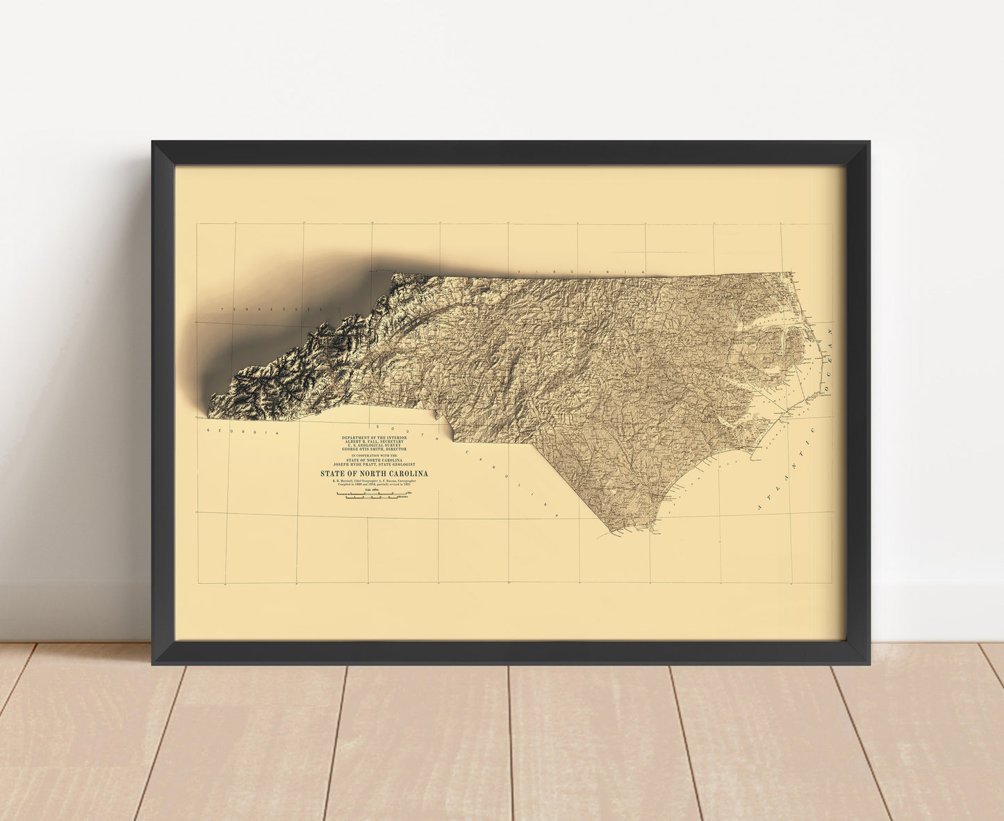 Vintage North Carolina shaded relief map in black frame. Artistic print with realistic terrain effect for wall decor