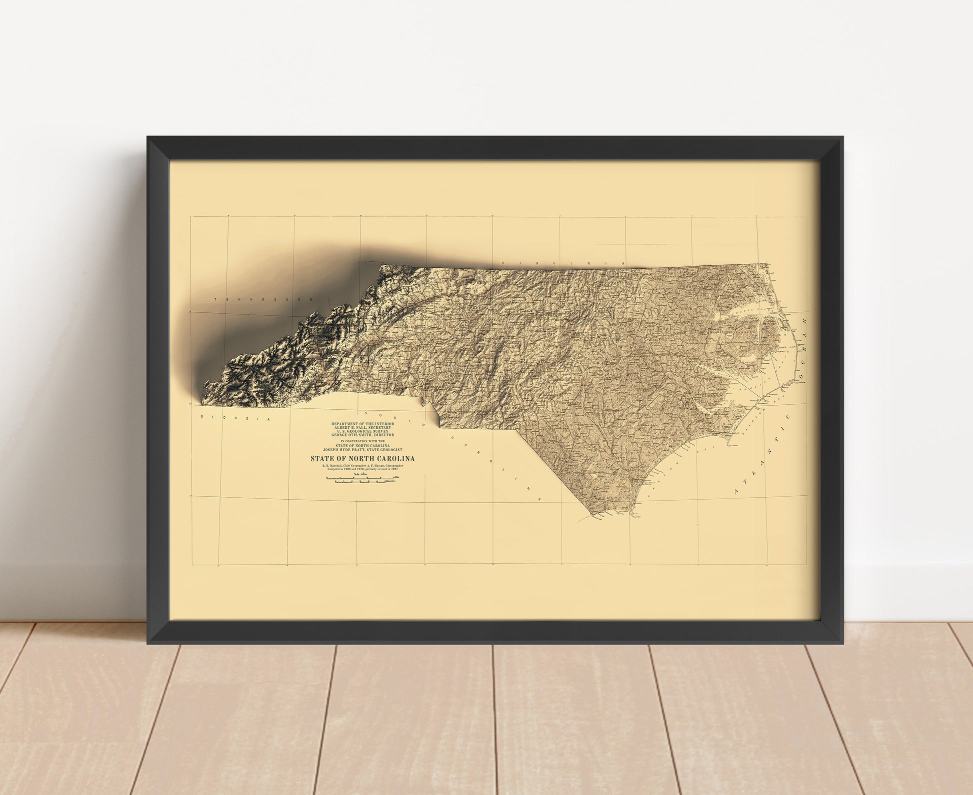 Vintage North Carolina shaded relief map in black frame. Artistic print with realistic terrain effect for wall decor