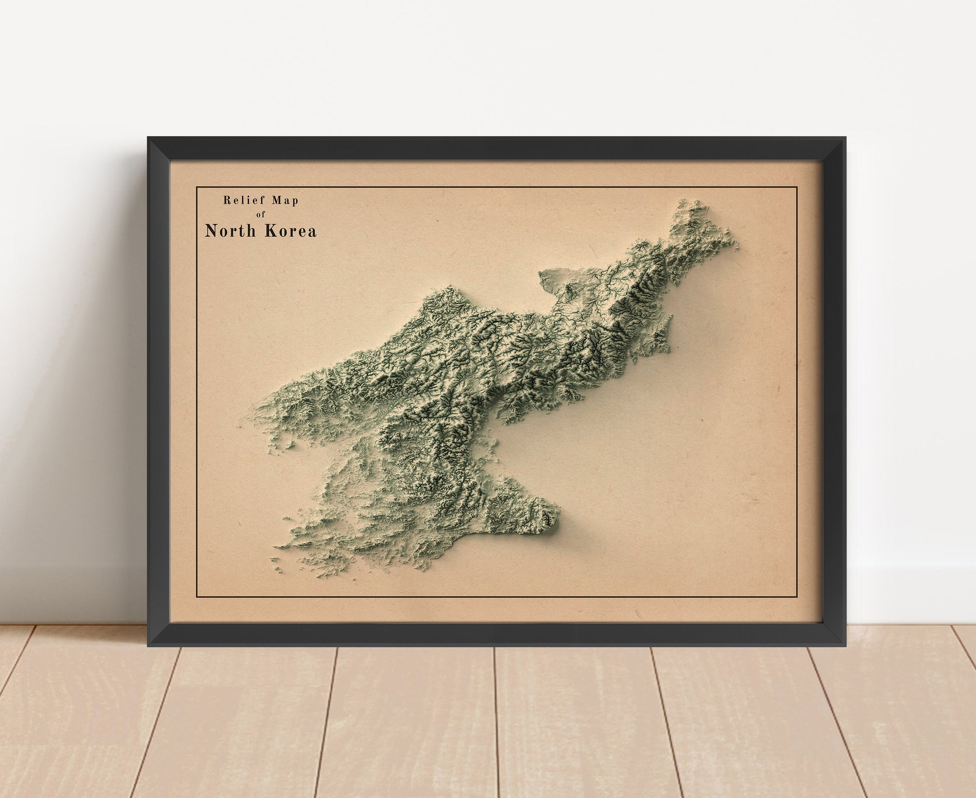 Vintage North Korea shaded relief map in black frame. Artistic print with realistic terrain effect for wall decor