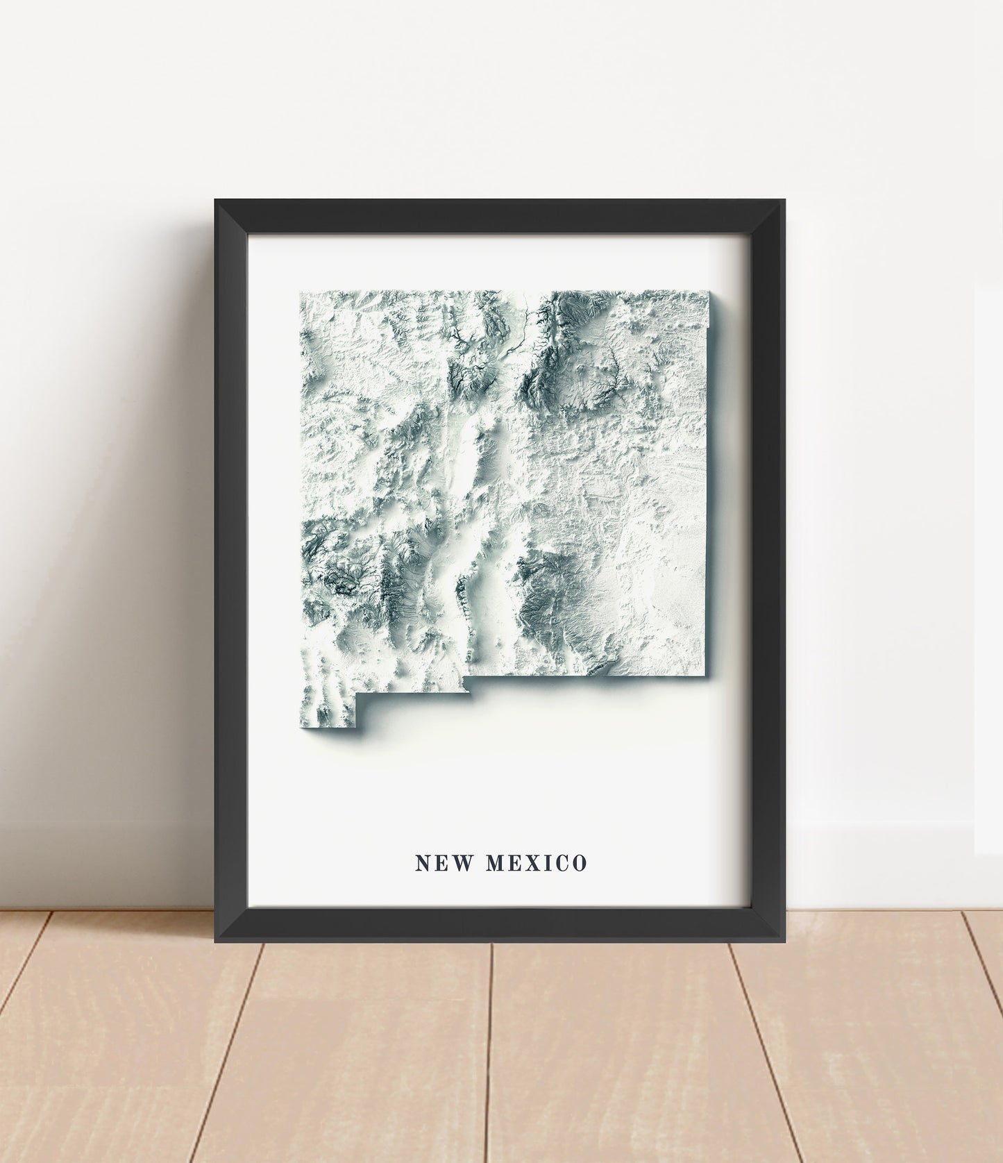 New Mexico shaded relief map in black frame. Artistic print with realistic terrain effect for wall decor