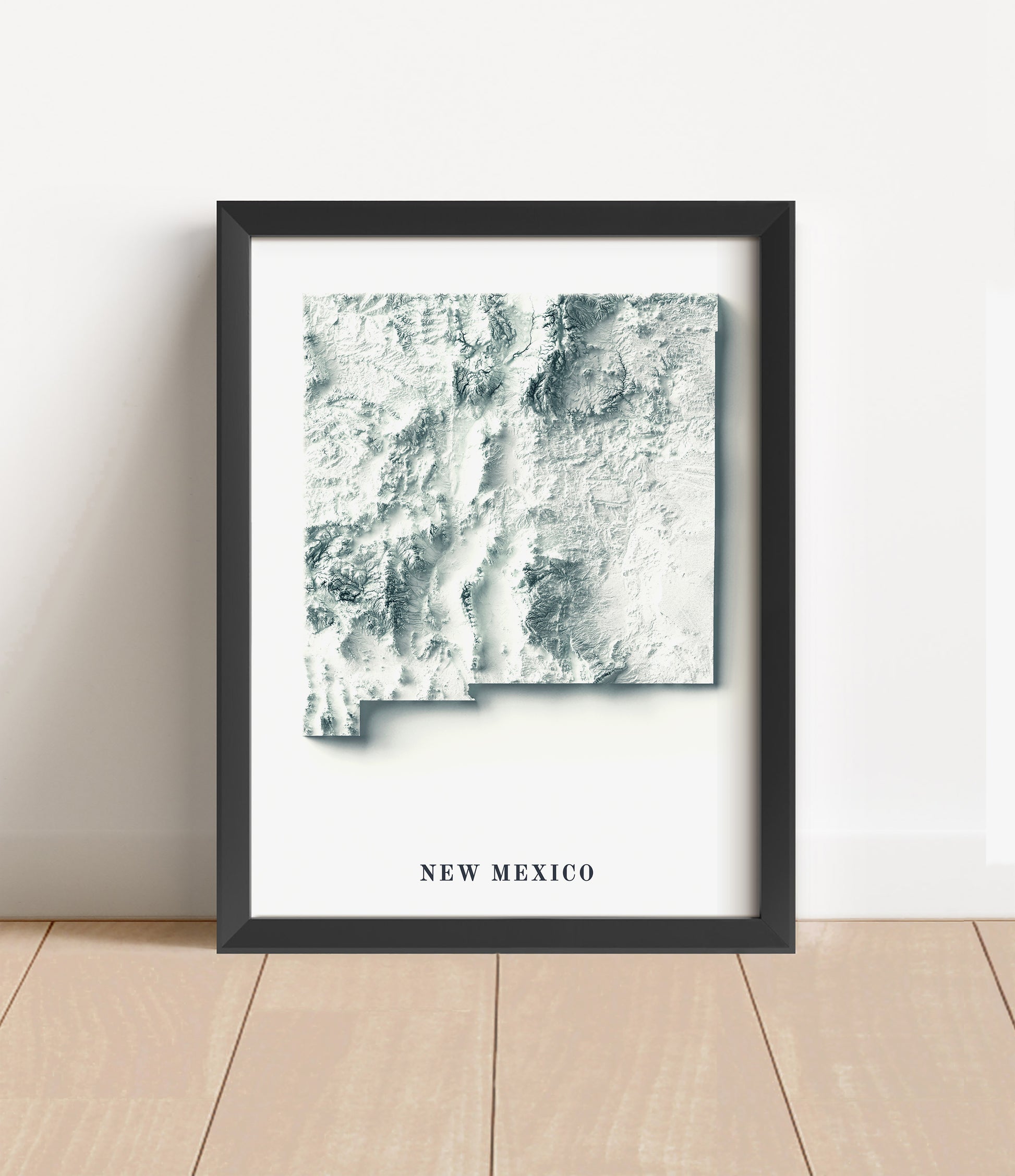 New Mexico shaded relief map in black frame. Artistic print with realistic terrain effect for wall decor