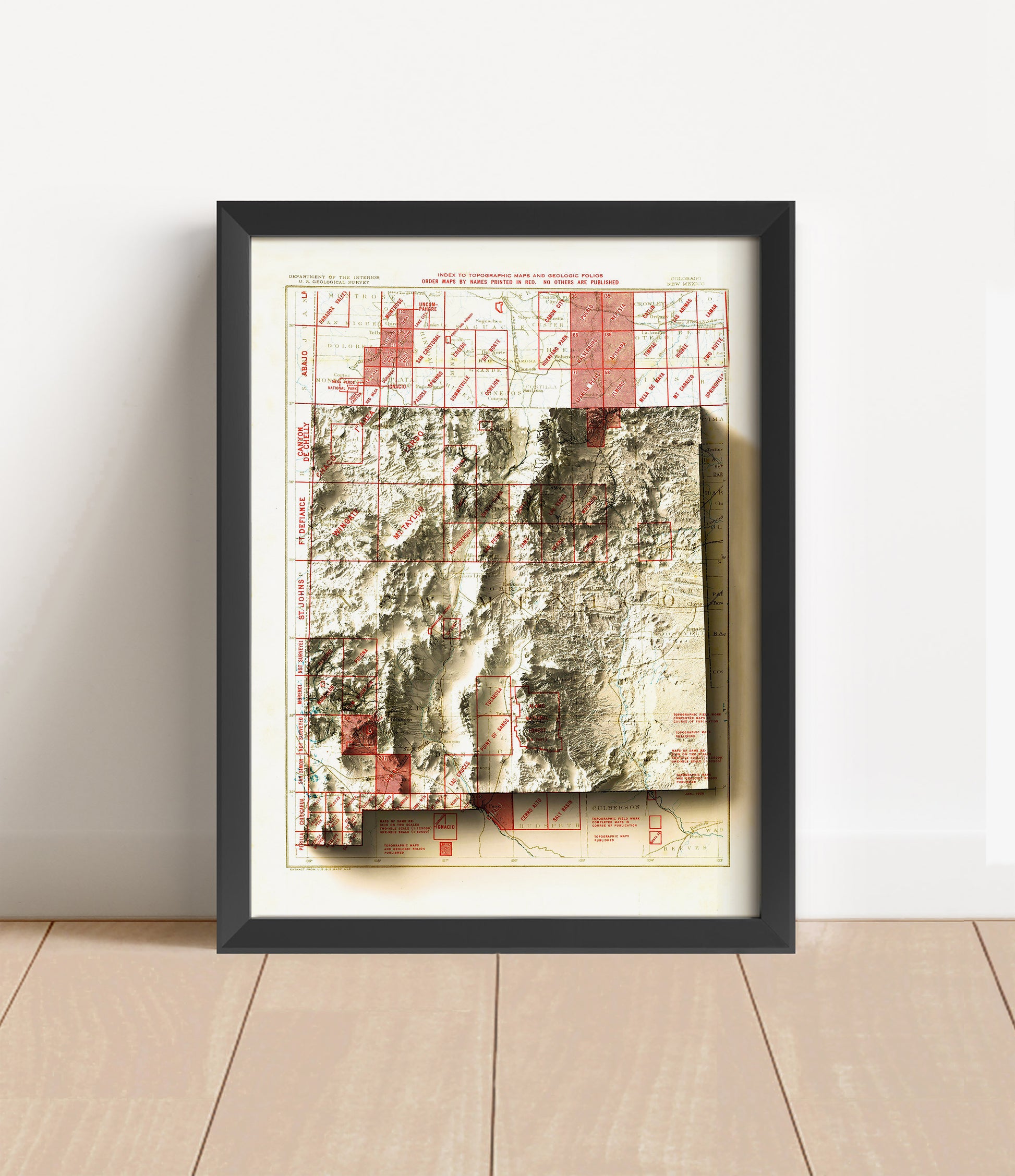 Vintage New Mexico shaded relief map in black frame. Artistic print with realistic terrain effect for wall decor