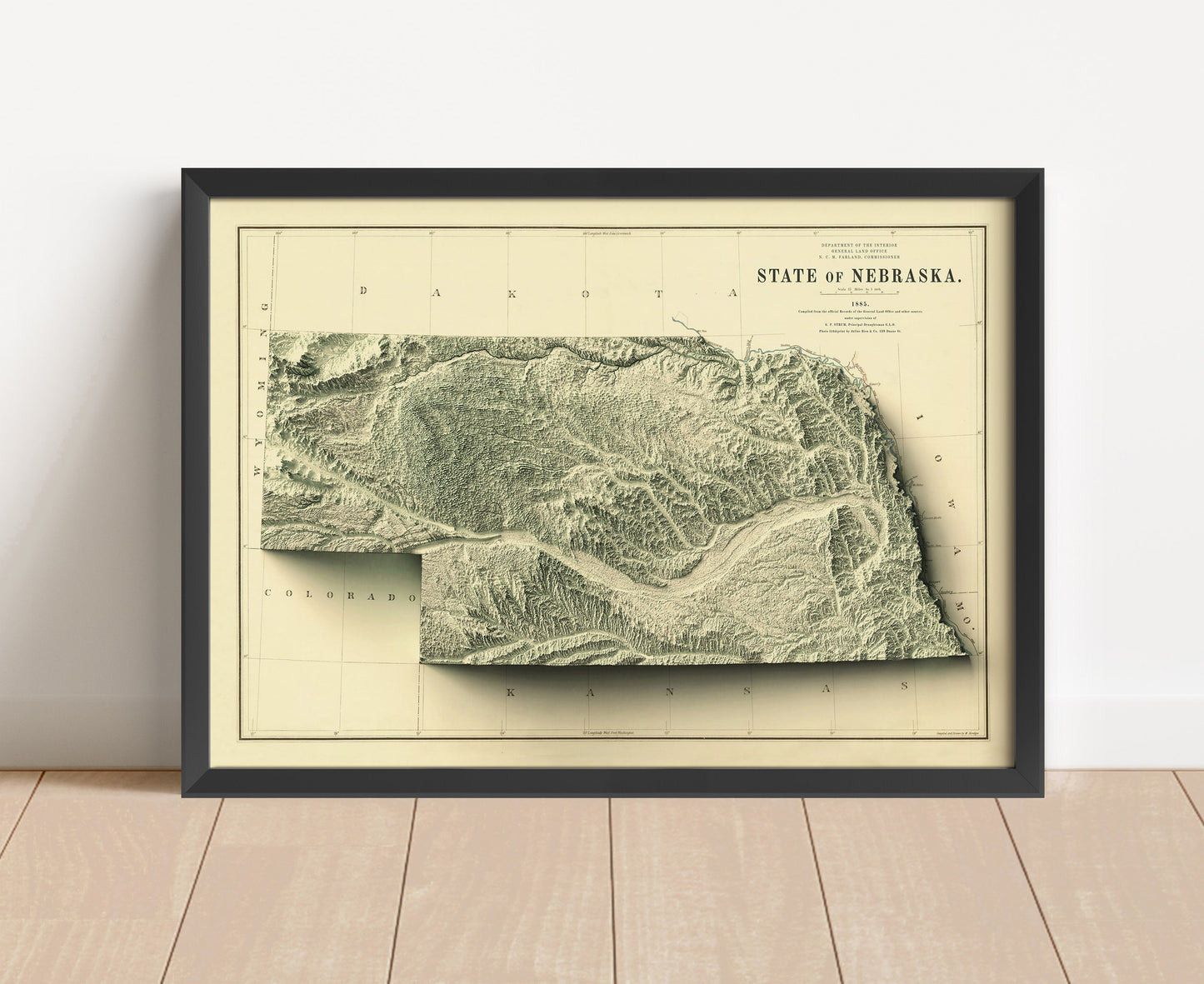 Vintage Nebraska shaded relief map in black frame. Artistic print with realistic terrain effect for wall decor