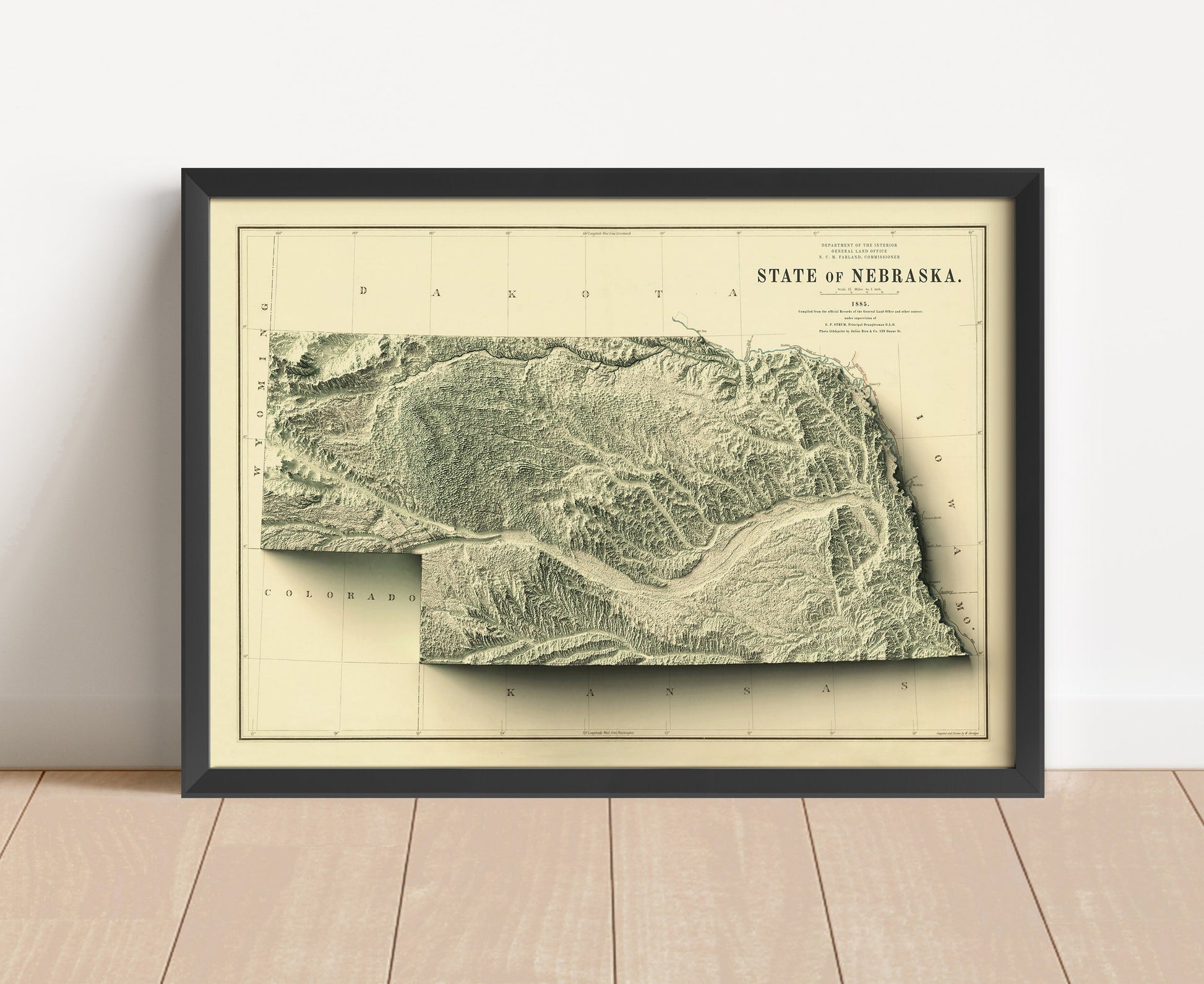 Vintage Nebraska shaded relief map in black frame. Artistic print with realistic terrain effect for wall decor