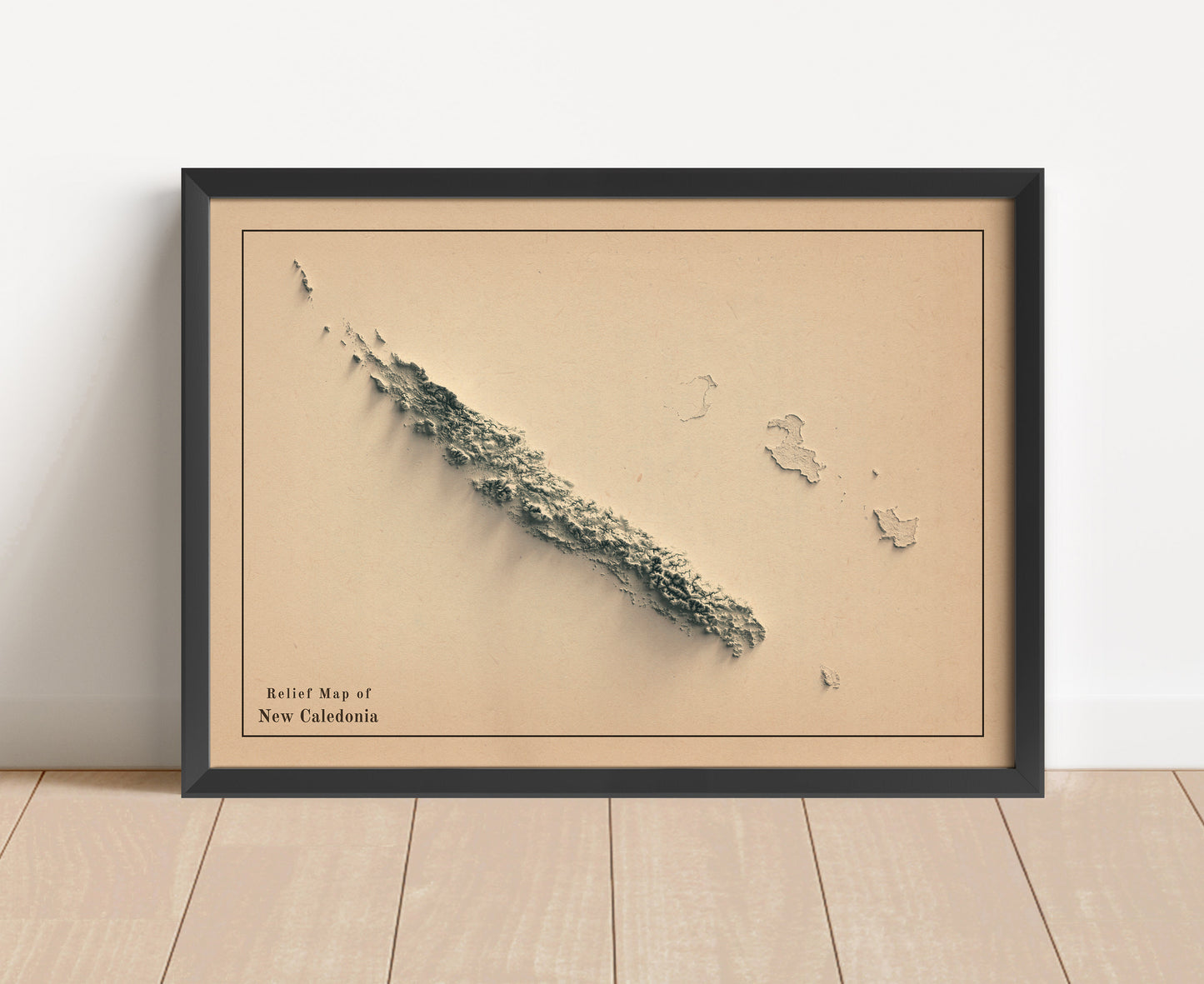 Vintage New Caledonia shaded relief map in black frame. Artistic print with realistic terrain effect for wall decor
