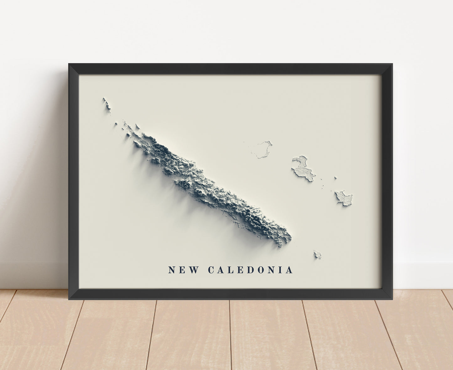 New Caledonia shaded relief map in black frame. Artistic print with realistic terrain effect for wall decor