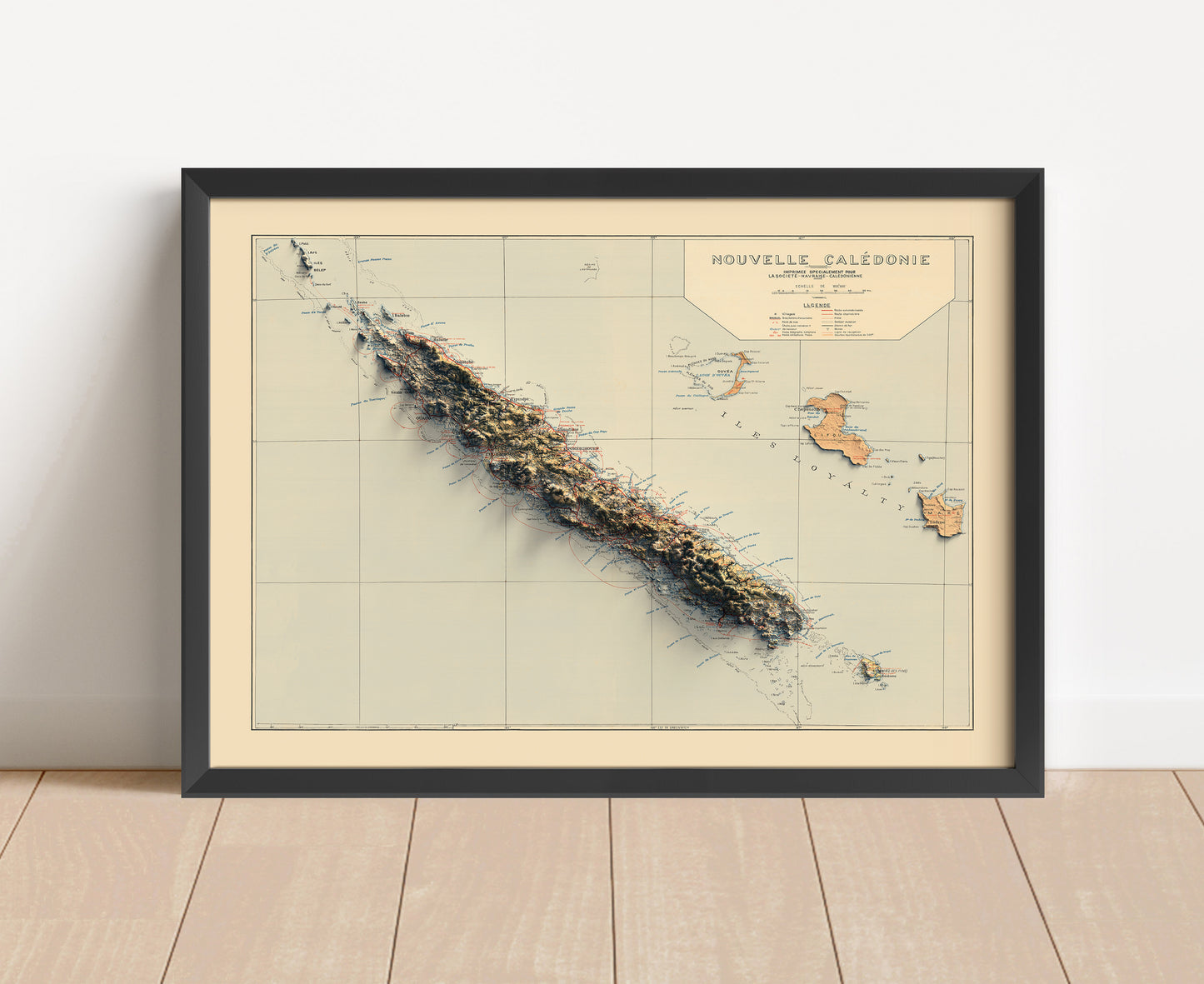 Vintage New Caledonia shaded relief map in black frame. Artistic print with realistic terrain effect for wall decor