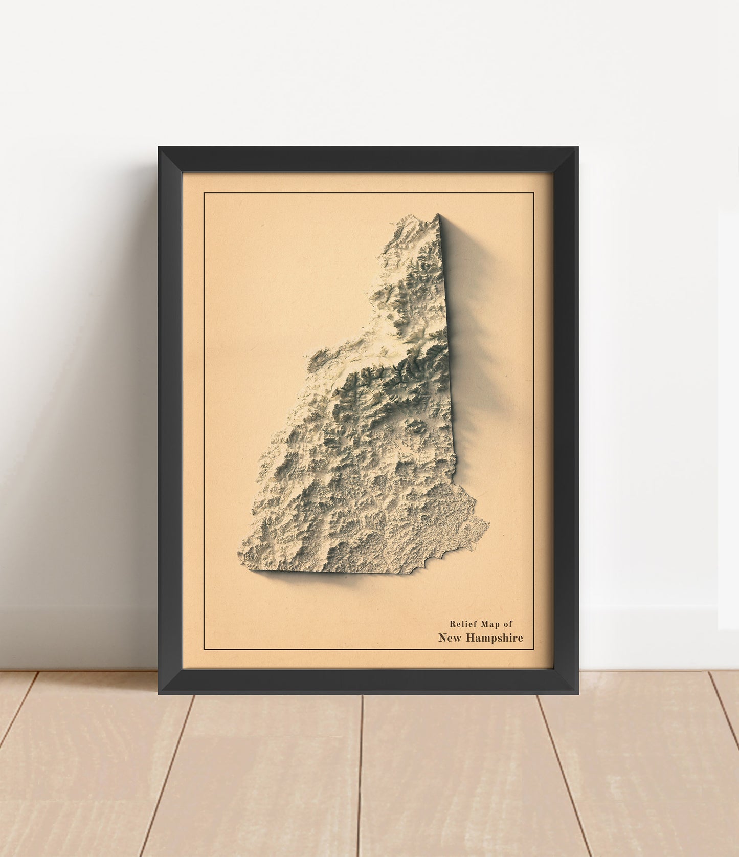 Vintage New Hampshire shaded relief map in black frame. Artistic print with realistic terrain effect for wall decor