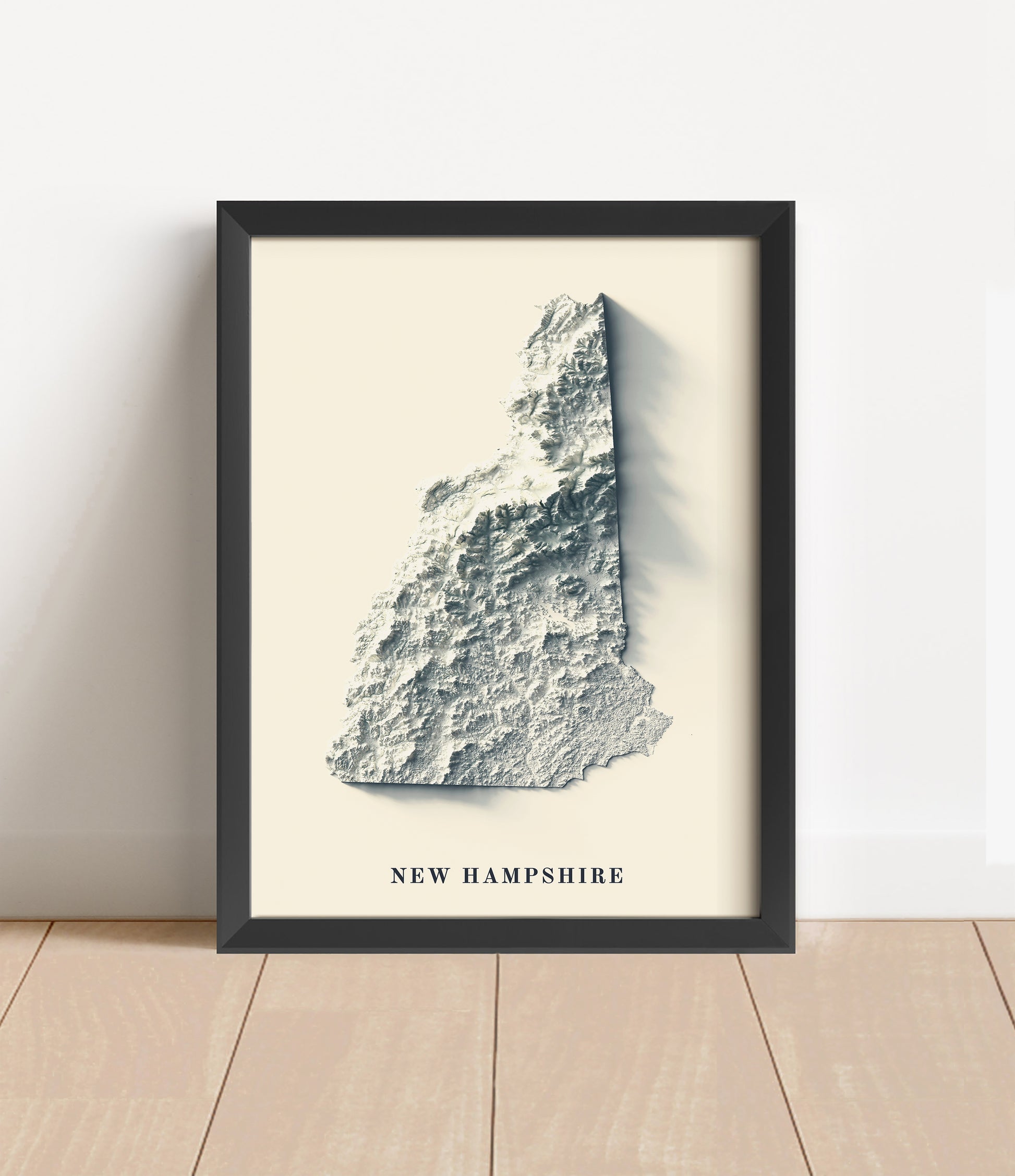 New Hampshire shaded relief map in black frame. Artistic print with realistic terrain effect for wall decor