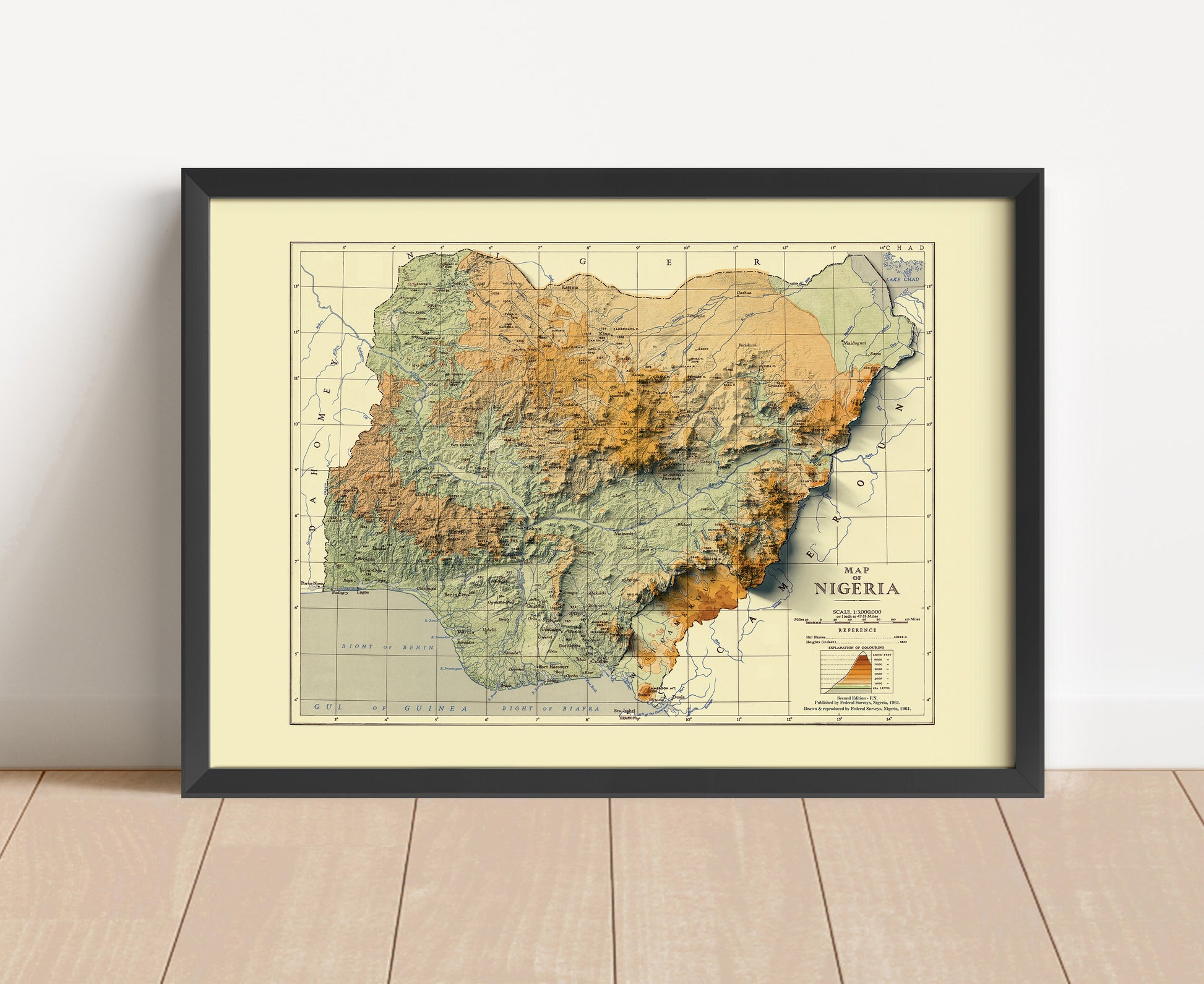 Vintage Nigeria shaded relief map in black frame. Artistic print with realistic terrain effect for wall decor