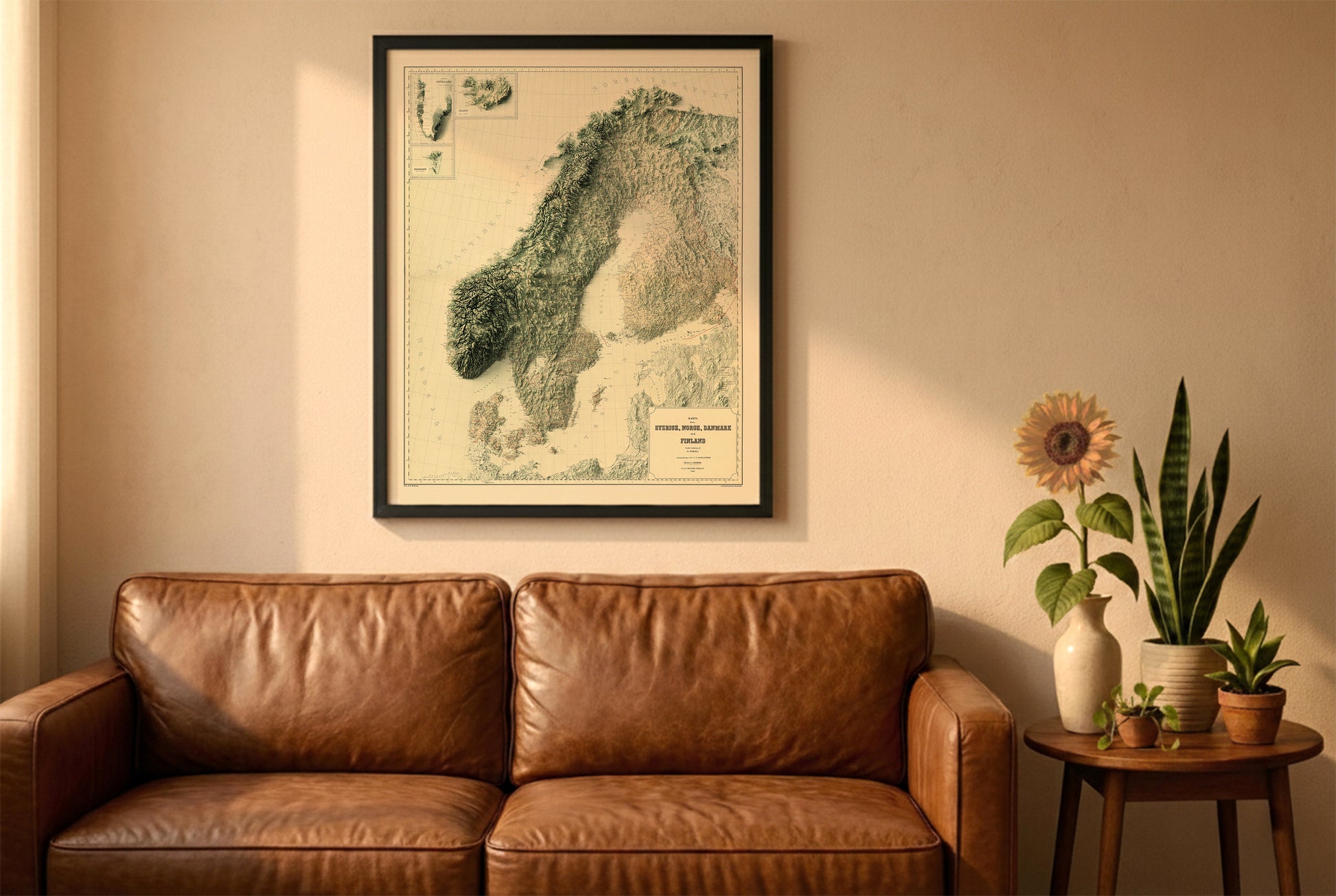 Scandinavia vintage relief map in a black frame above a brown leather sofa. Boho living room with warm sunlight, sunflower, and indoor plants on a wooden side table