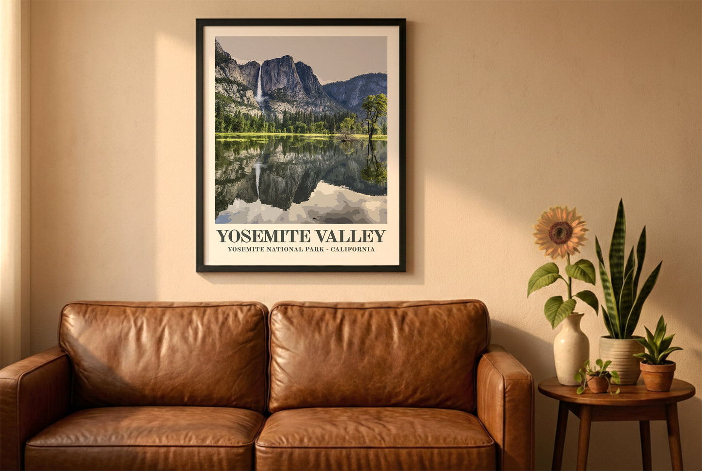 Yosemite poster in a black frame above a brown leather sofa. Boho living room with warm sunlight, sunflower, and indoor plants on a wooden side table
