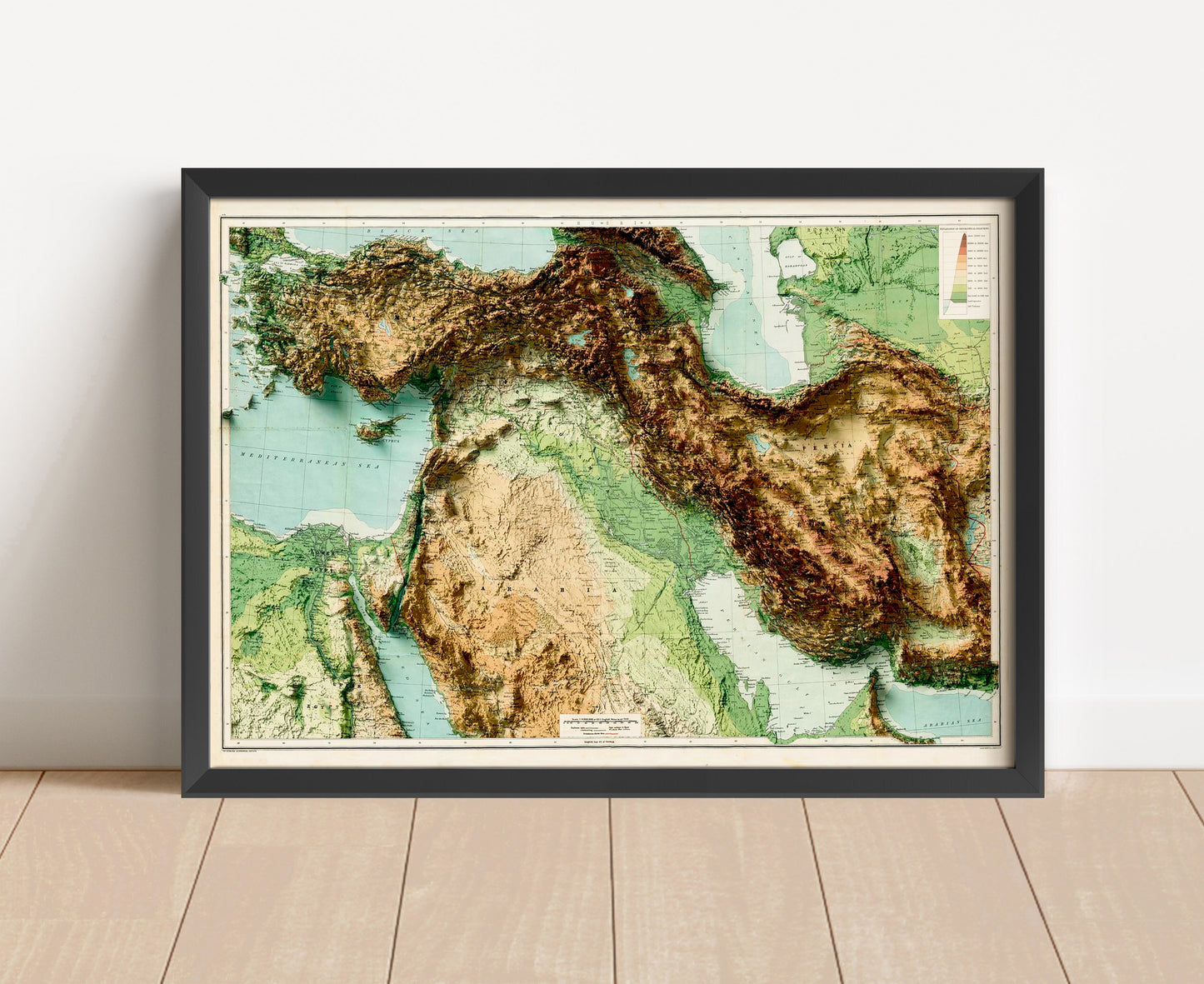 Vintage Middle East shaded relief map in black frame. Artistic print with realistic terrain effect for wall decor