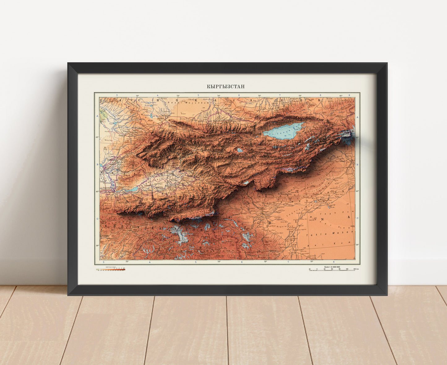 Vintage Kyrgyzstan shaded relief map in black frame. Artistic print with realistic terrain effect for wall decor