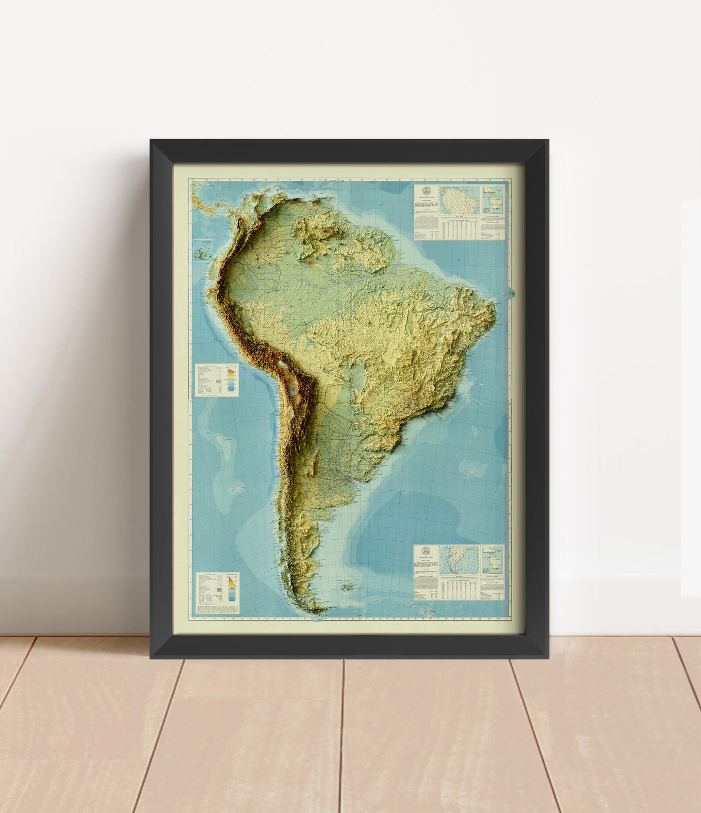 Vintage South America shaded relief map in black frame. Artistic print with realistic terrain effect for wall decor