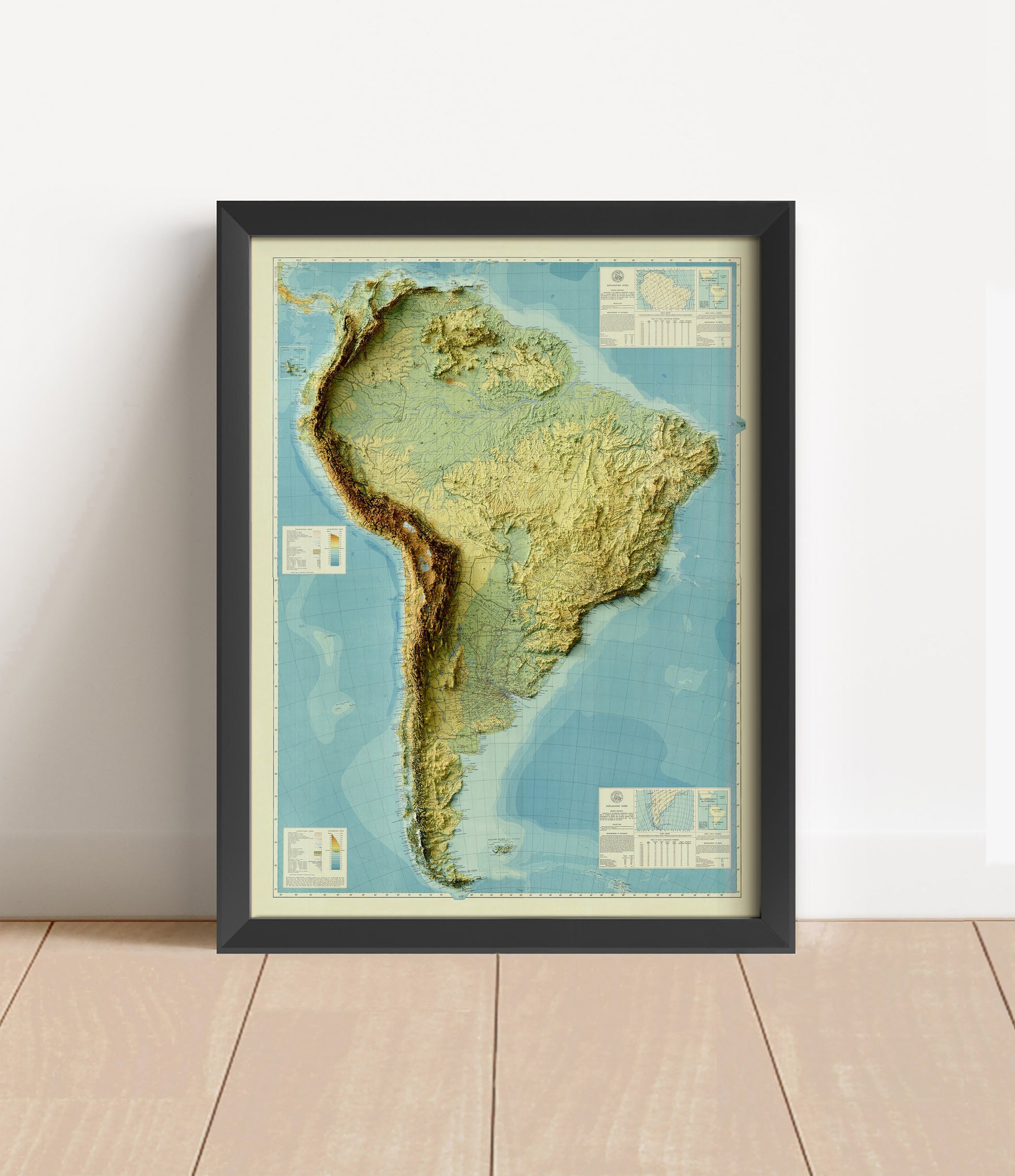 Vintage South America shaded relief map in black frame. Artistic print with realistic terrain effect for wall decor