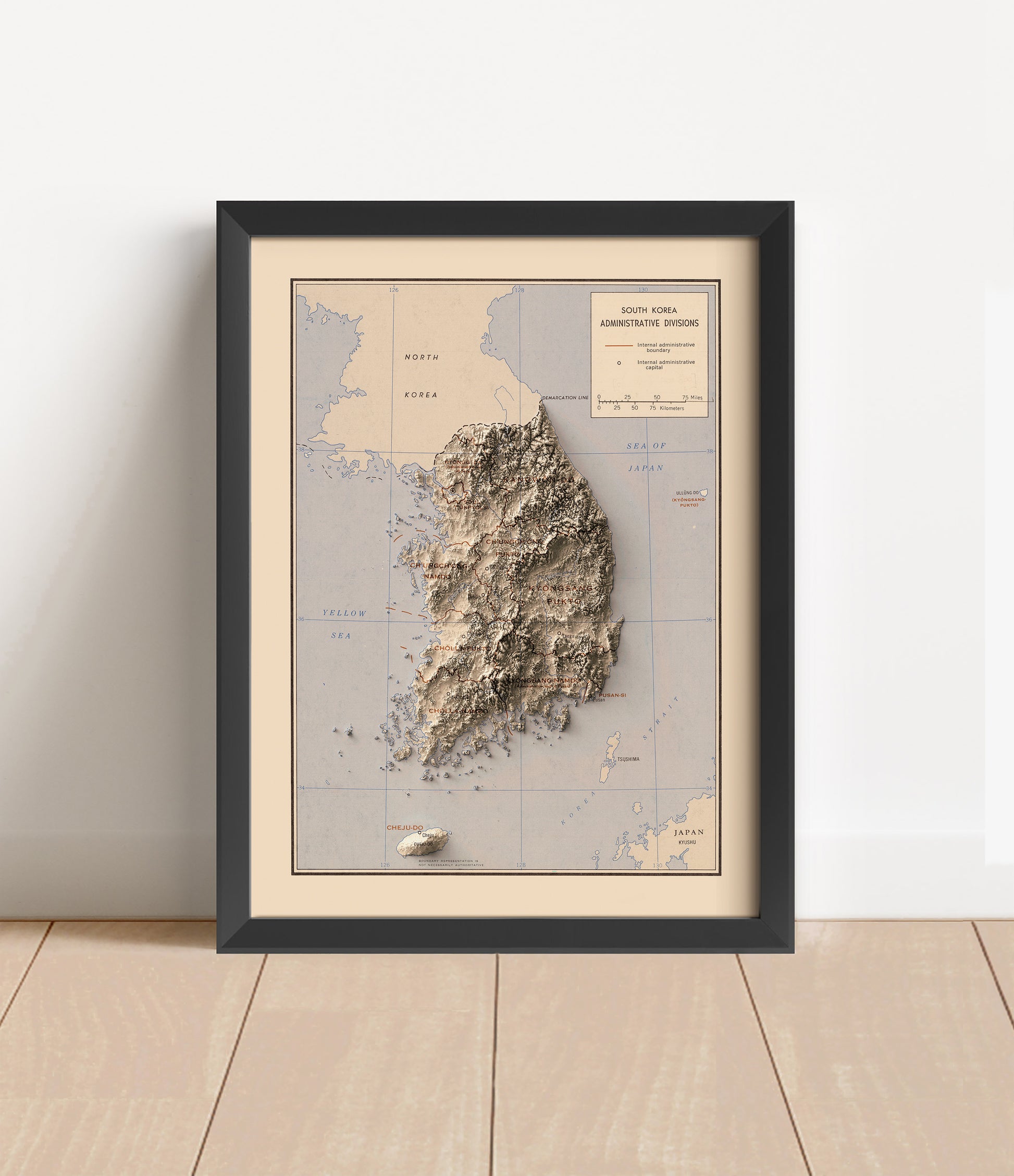 Vintage South Korea shaded relief map in black frame. Artistic print with realistic terrain effect for wall decor