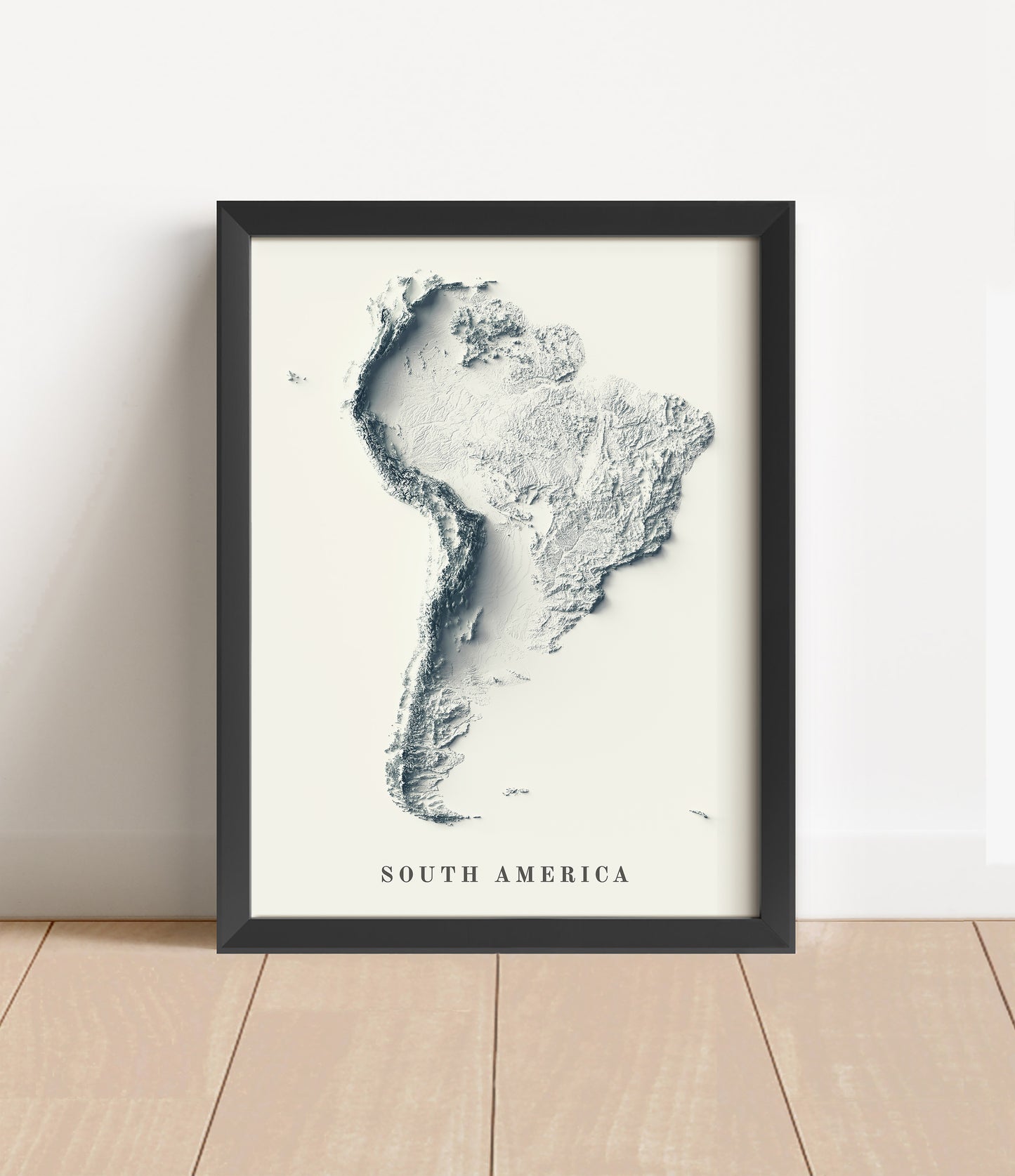 South America shaded relief map in black frame. Artistic print with realistic terrain effect for wall decor