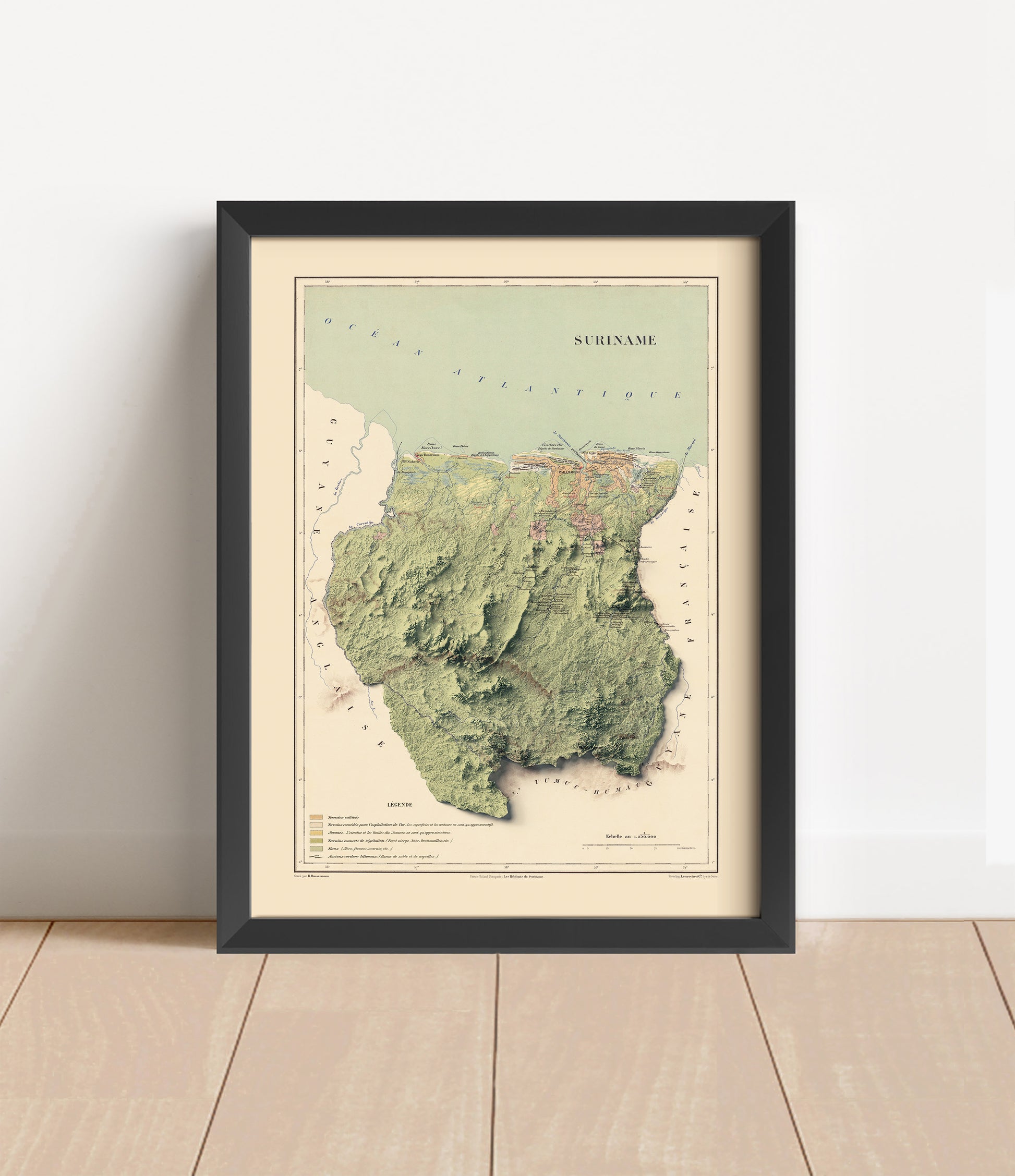 Vintage Suriname shaded relief map in black frame. Artistic print with realistic terrain effect for wall decor