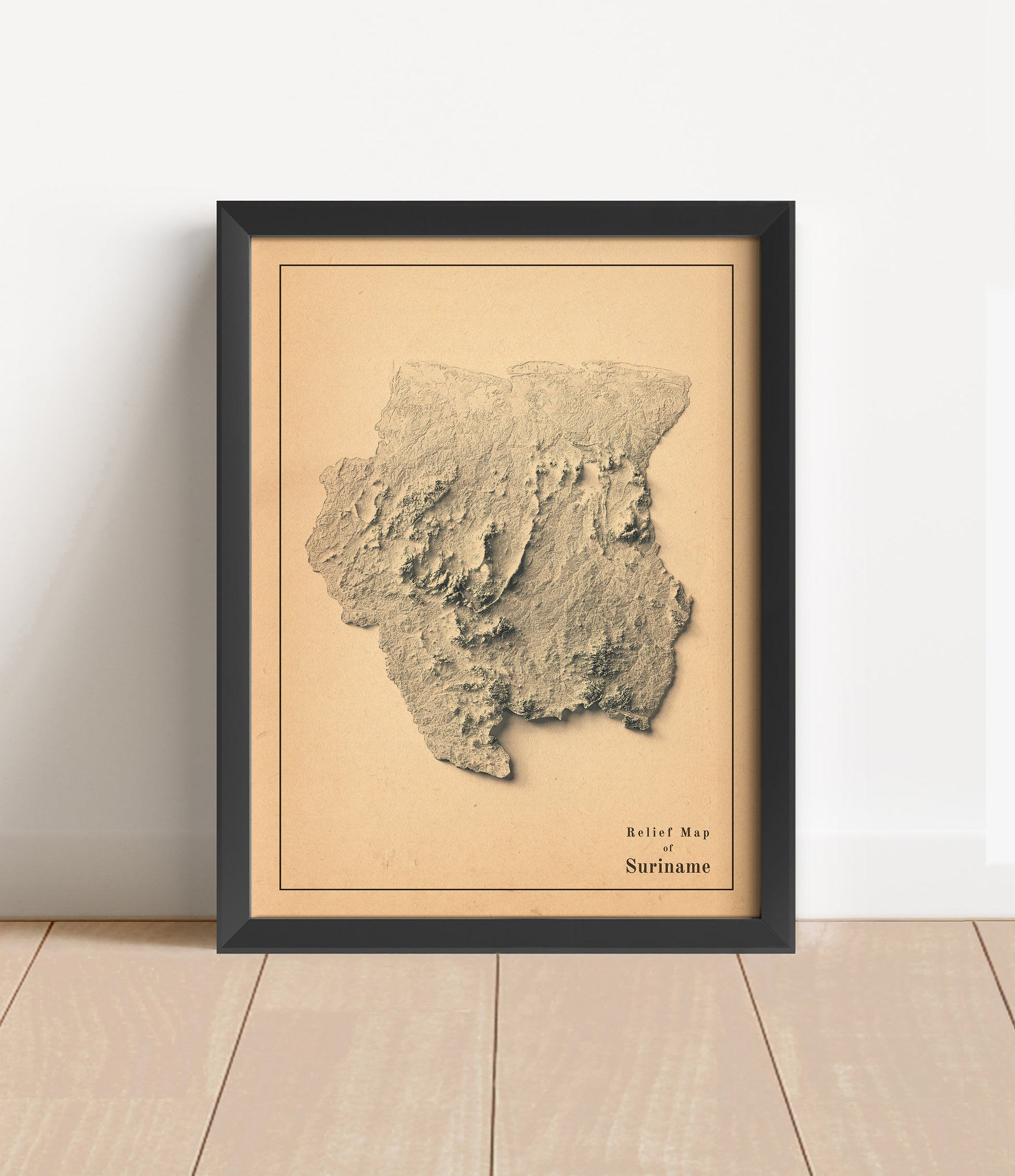 Vintage Suriname shaded relief map in black frame. Artistic print with realistic terrain effect for wall decor