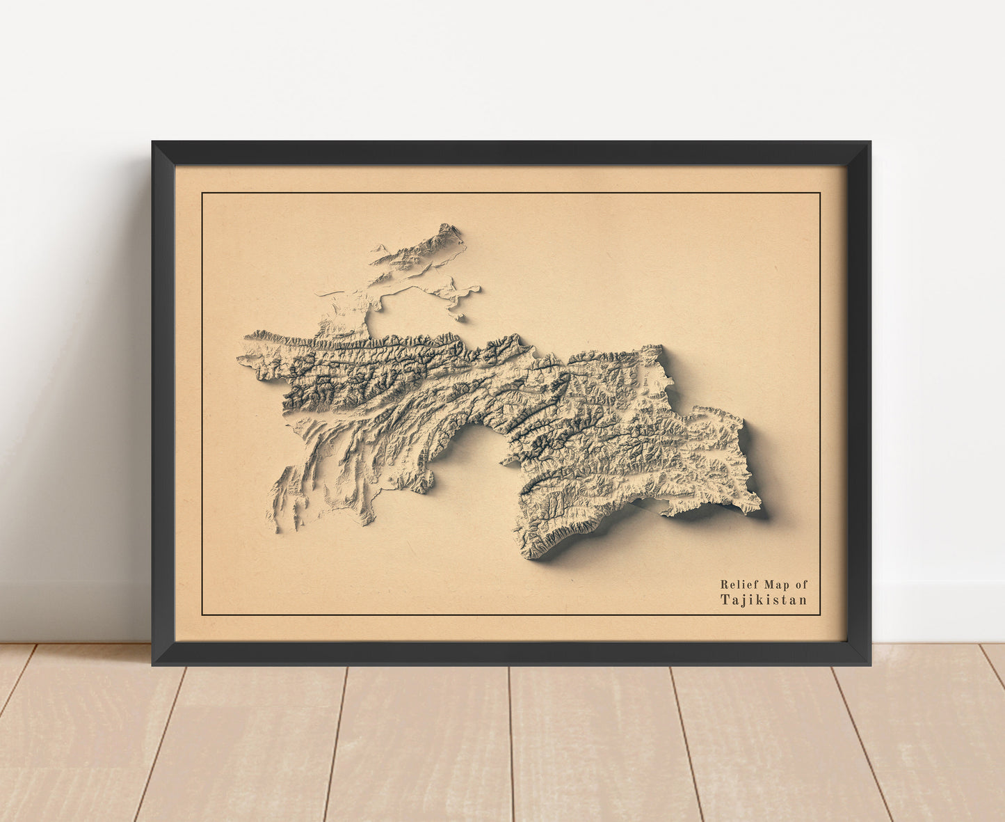 Vintage Tajikistan shaded relief map in black frame. Artistic print with realistic terrain effect for wall decor