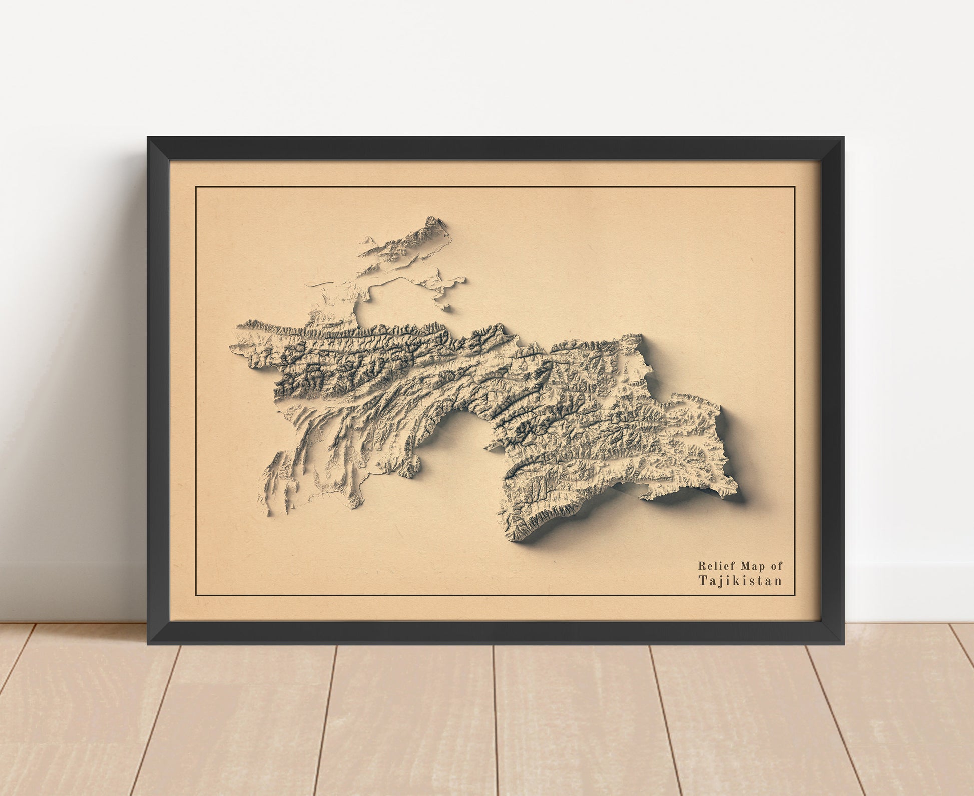 Vintage Tajikistan shaded relief map in black frame. Artistic print with realistic terrain effect for wall decor