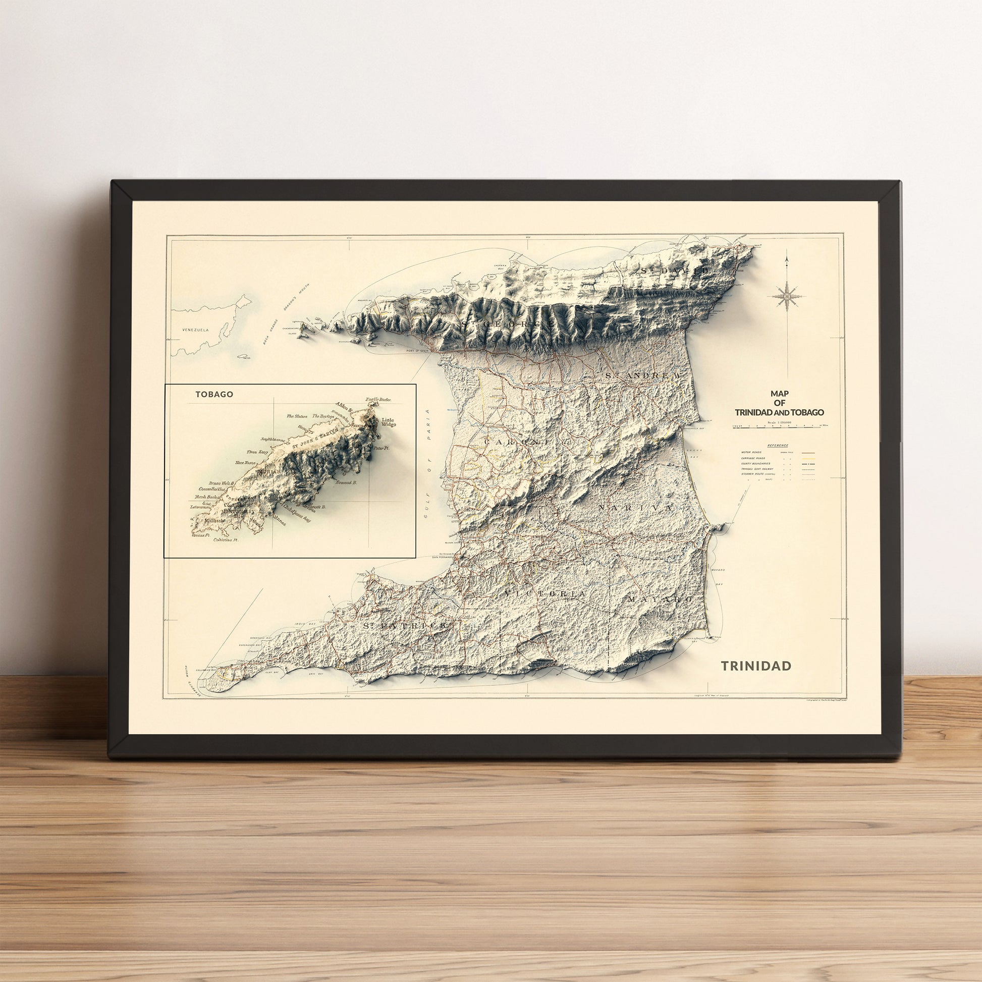 Trinidad and Tobago vintage framed shaded relief map in black frame. Artistic print highlighting mountains with a realistic terrain effect