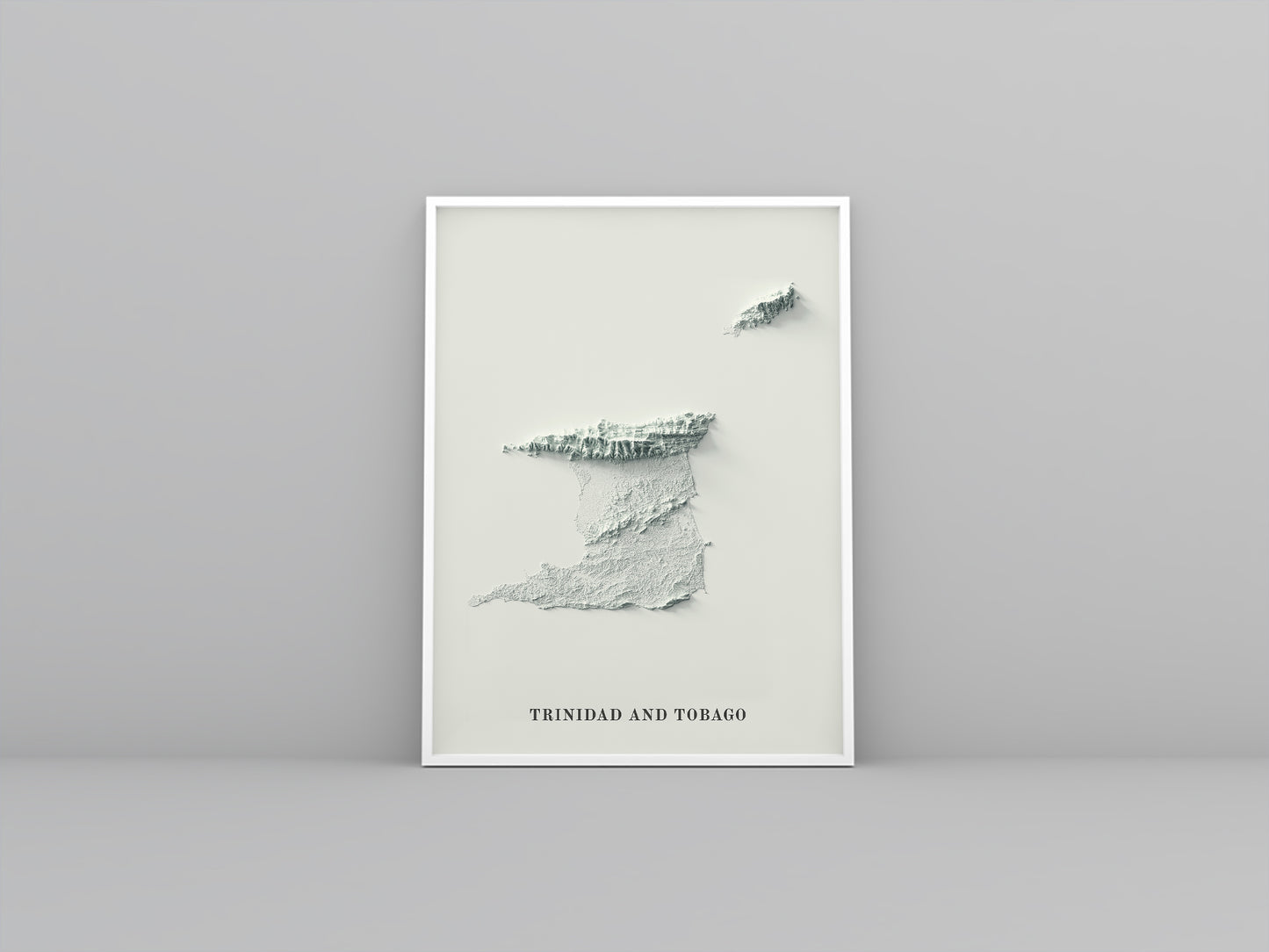 Trinidad and Tobago framed shaded relief map in white frame. Artistic print highlighting mountains with a realistic 3d effect