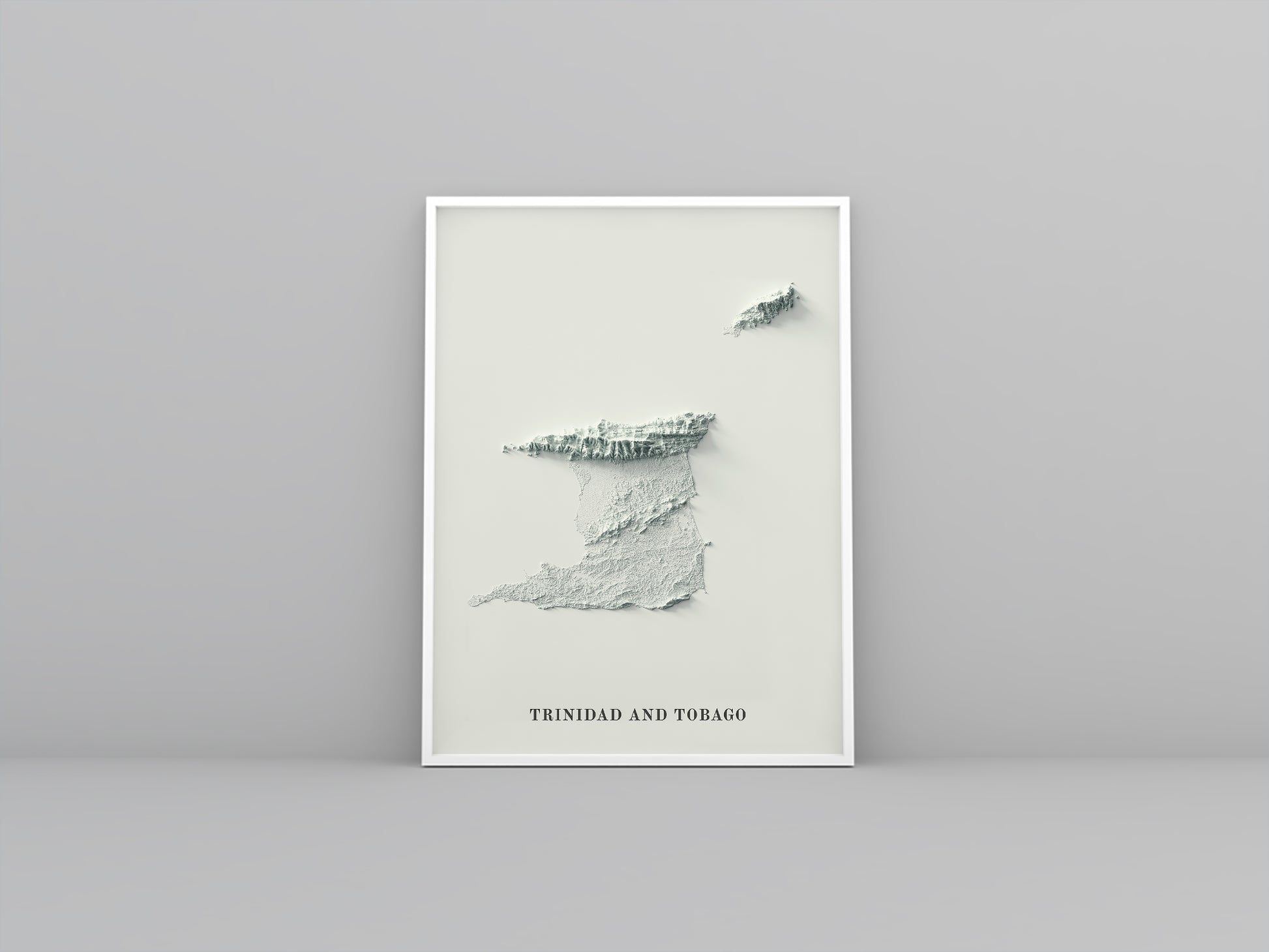 Trinidad and Tobago framed shaded relief map in white frame. Artistic print highlighting mountains with a realistic 3d effect
