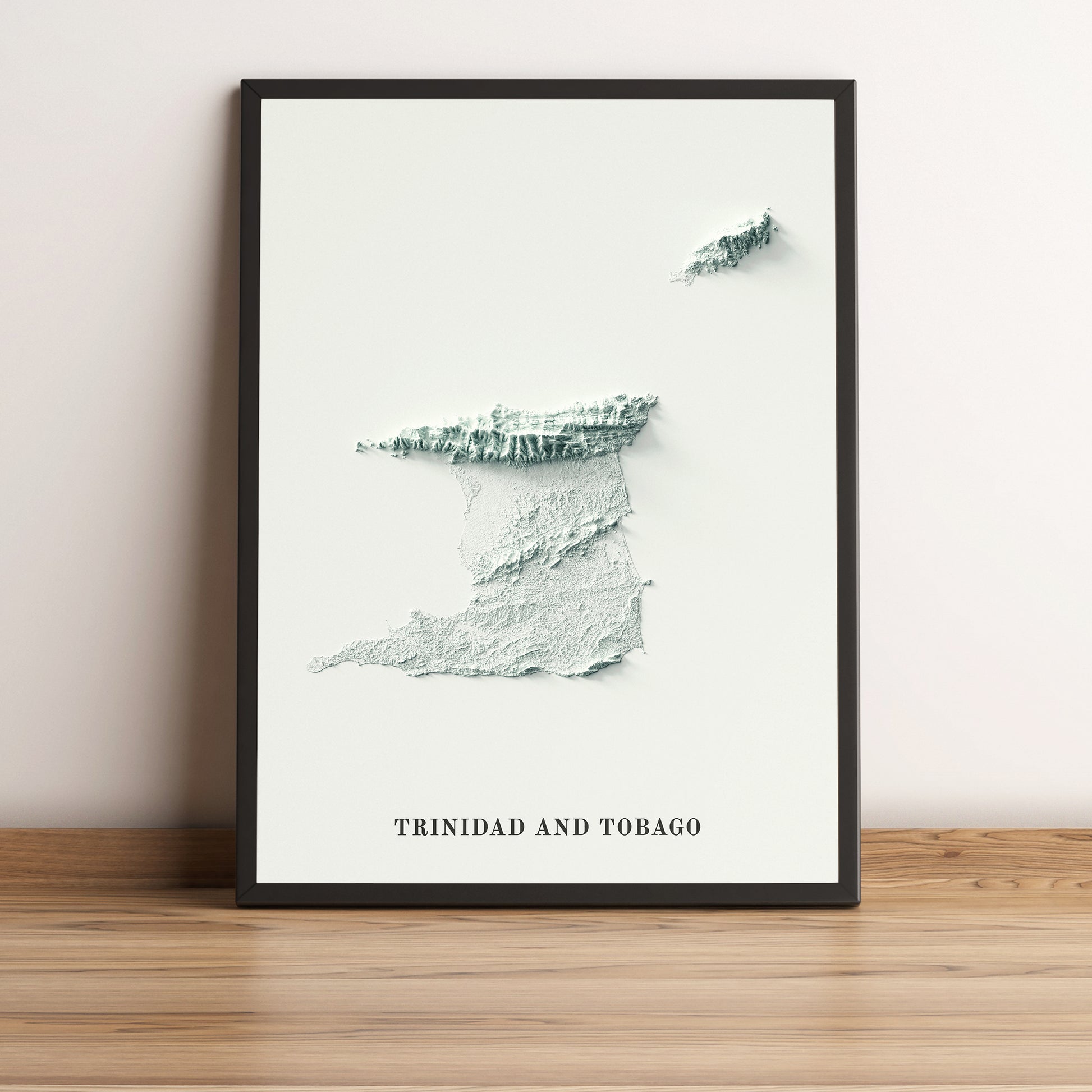 Trinidad and Tobago framed shaded relief map in black frame. Artistic print highlighting mountains with a realistic terrain effect