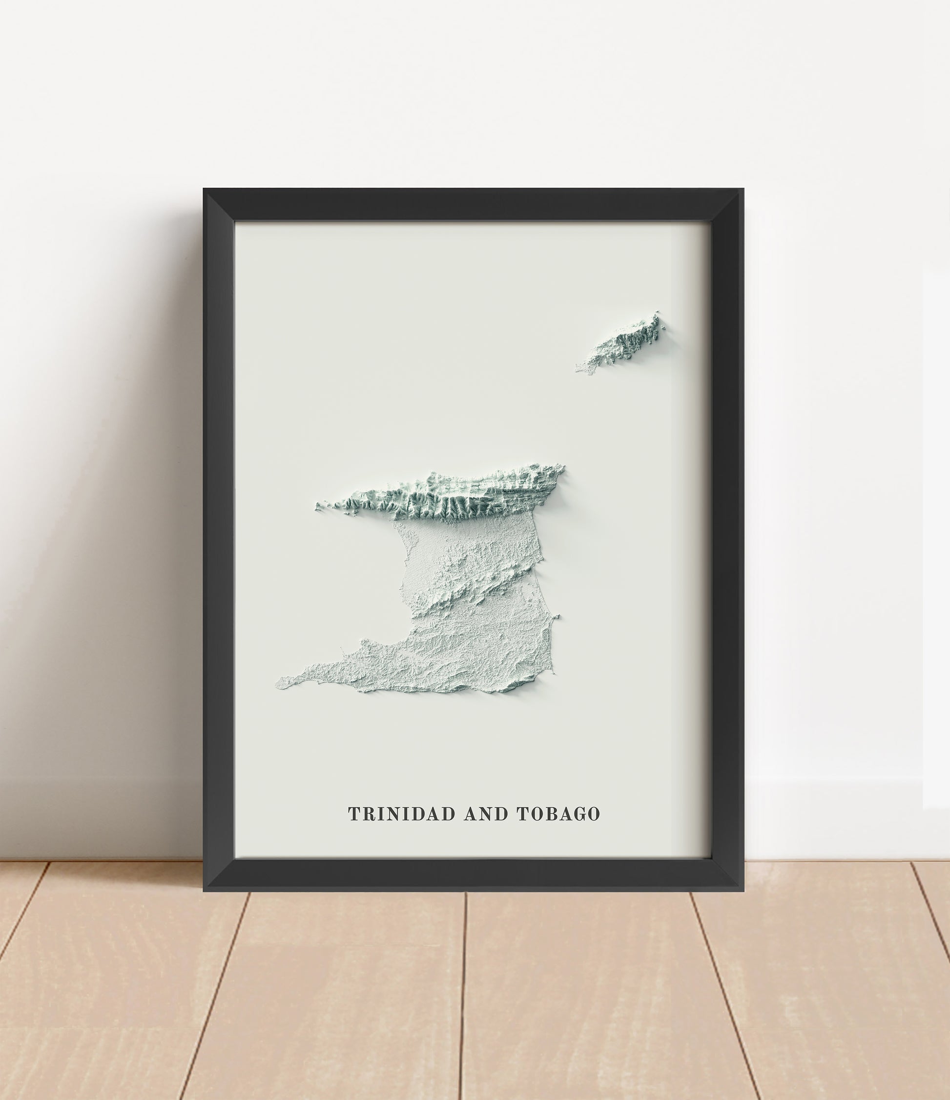 Trinidad and Tobago shaded relief map in black frame. Artistic print with realistic terrain effect for wall decor.