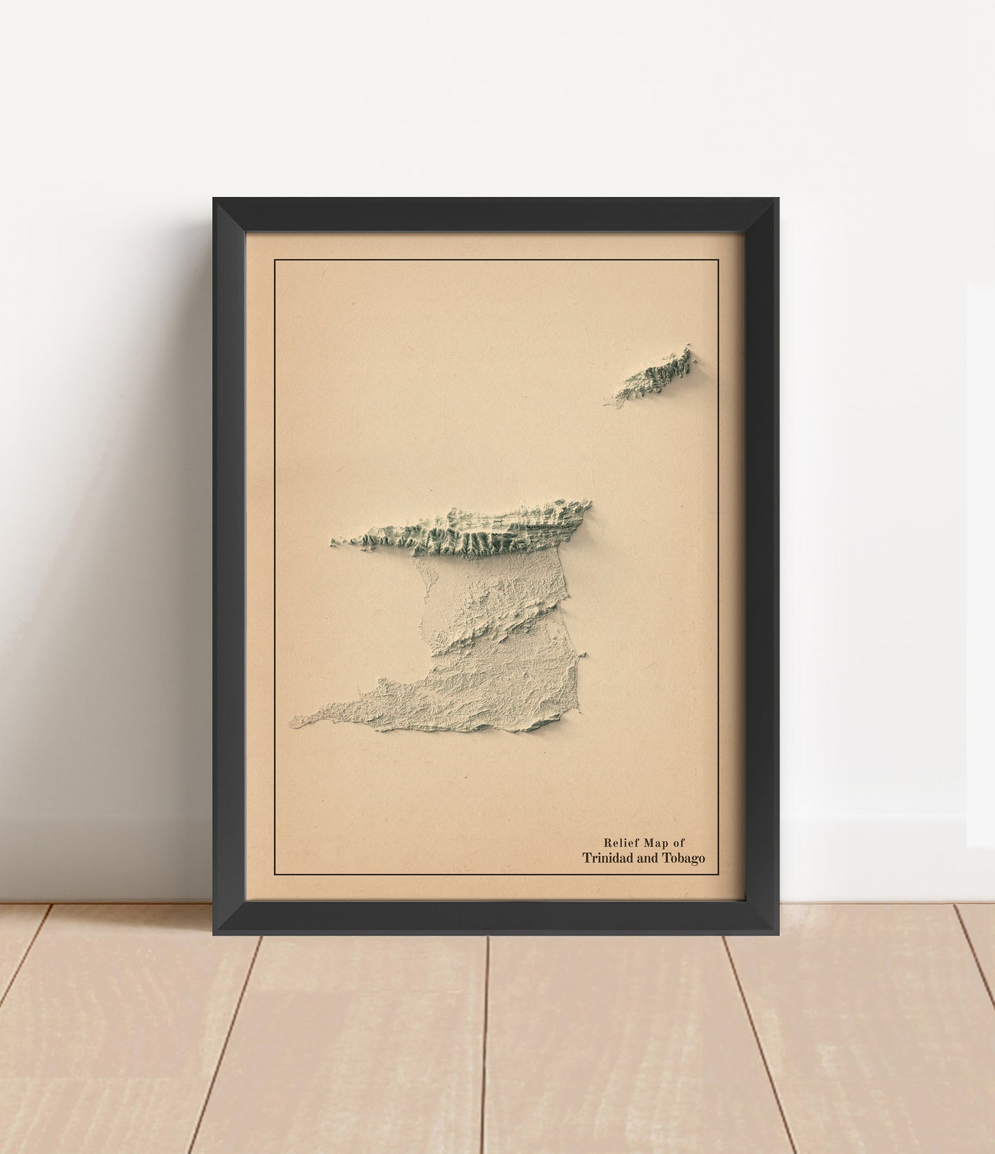 Vintage Trinidad and Tobago shaded relief map in black frame. Artistic print with realistic terrain effect for wall decor.