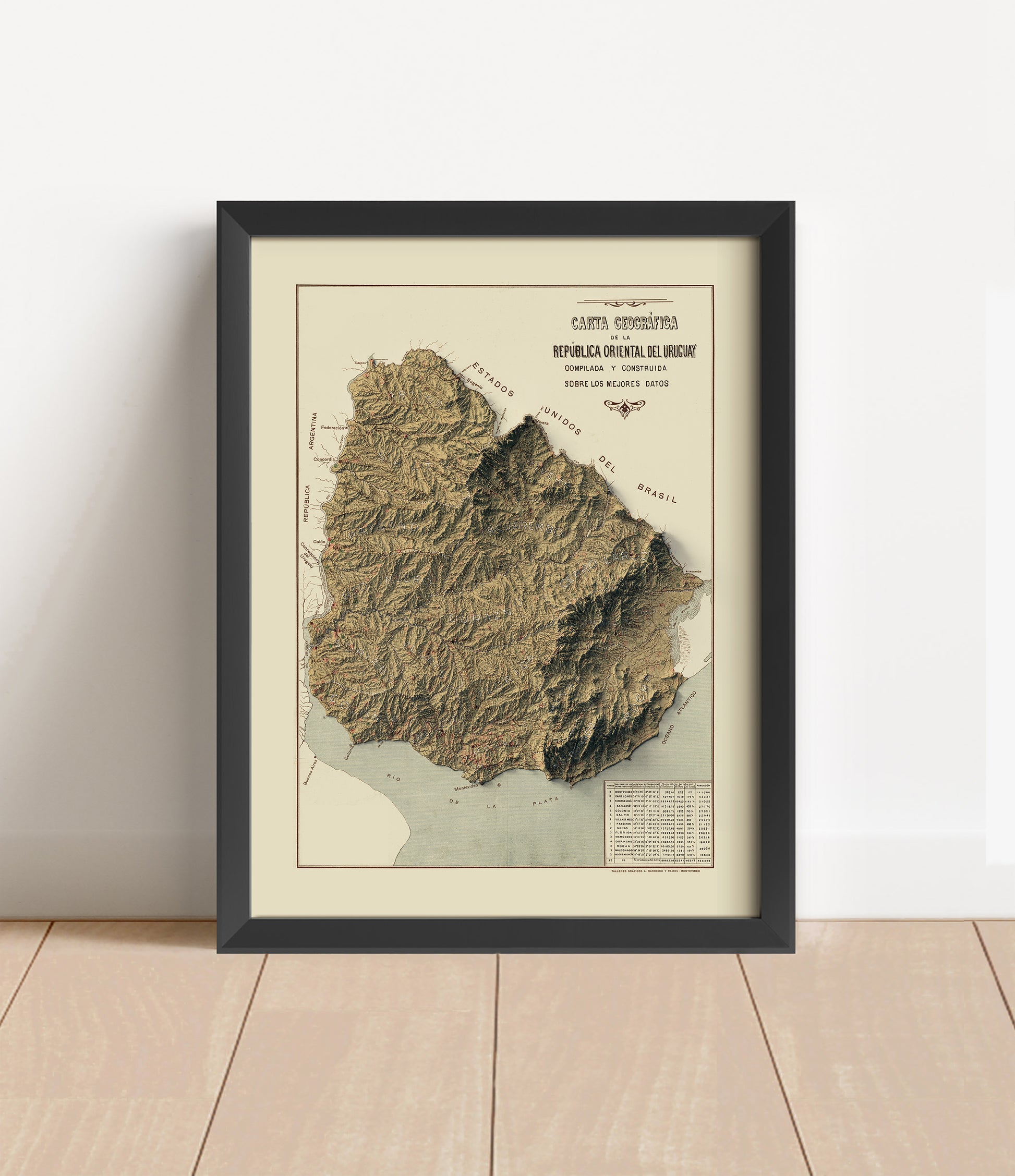 Vintage Uruguay shaded relief map in black frame. Artistic print with realistic terrain effect for wall decor